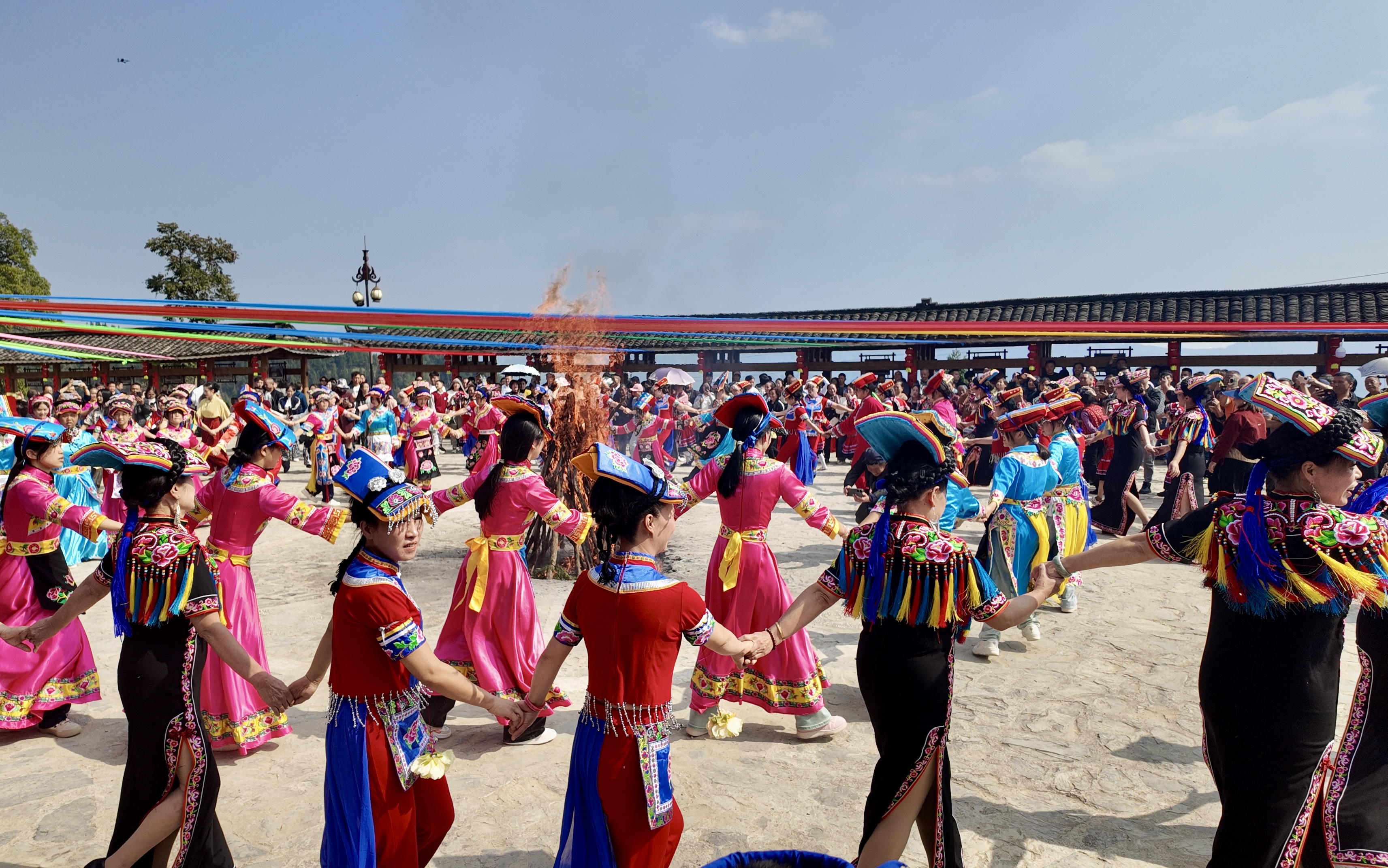 People of the Qiang ethnic group dressed in traditional costumes celebrate the Qiang New Year in a village in Jiangkou County, Tongren City, Guizhou Province, November 1, 2024. /Provided to CGTN