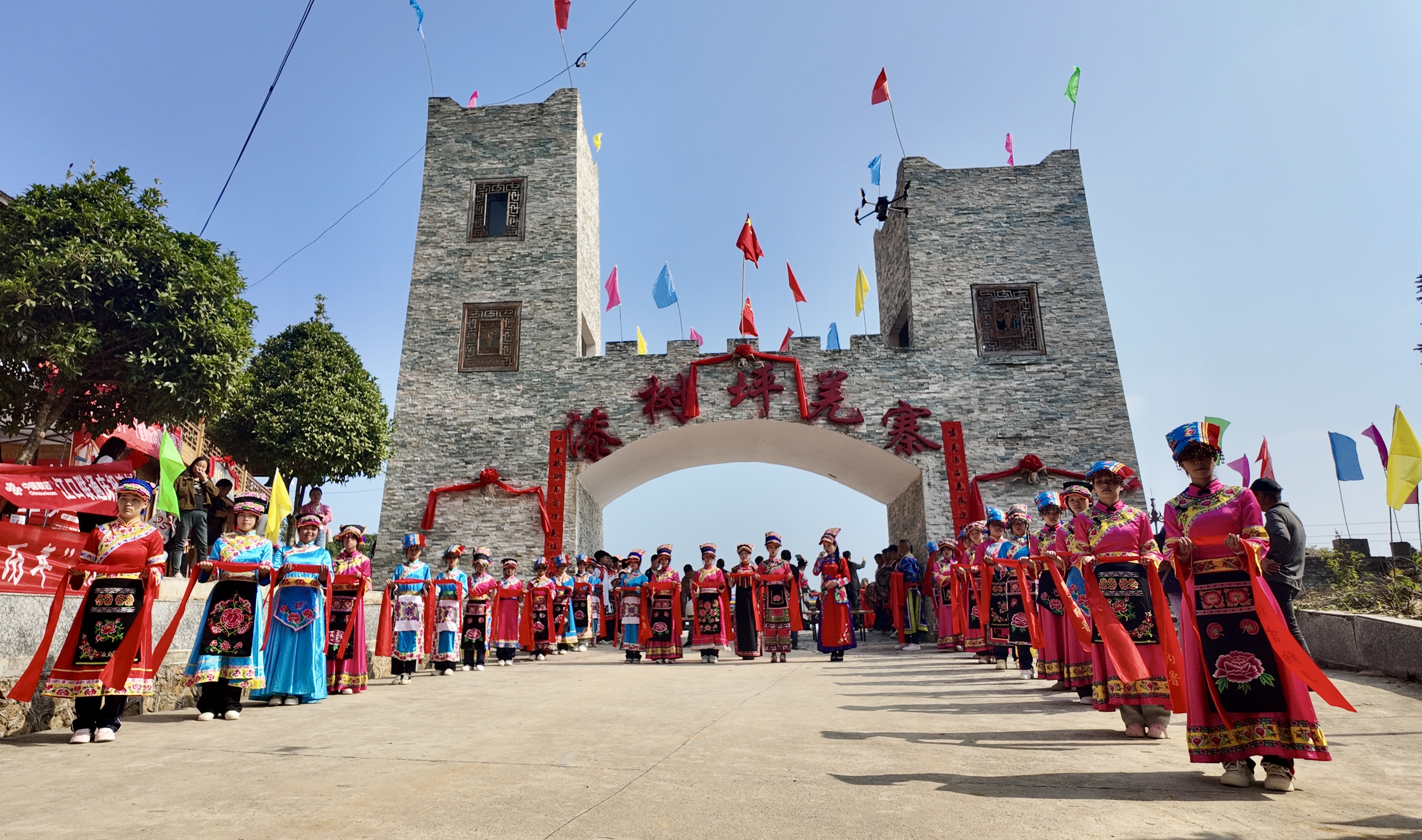 People of the Qiang ethnic group dressed in traditional costumes celebrate the Qiang New Year in a village in Jiangkou County, Tongren City, Guizhou Province, November 1, 2024. /Provided to CGTN