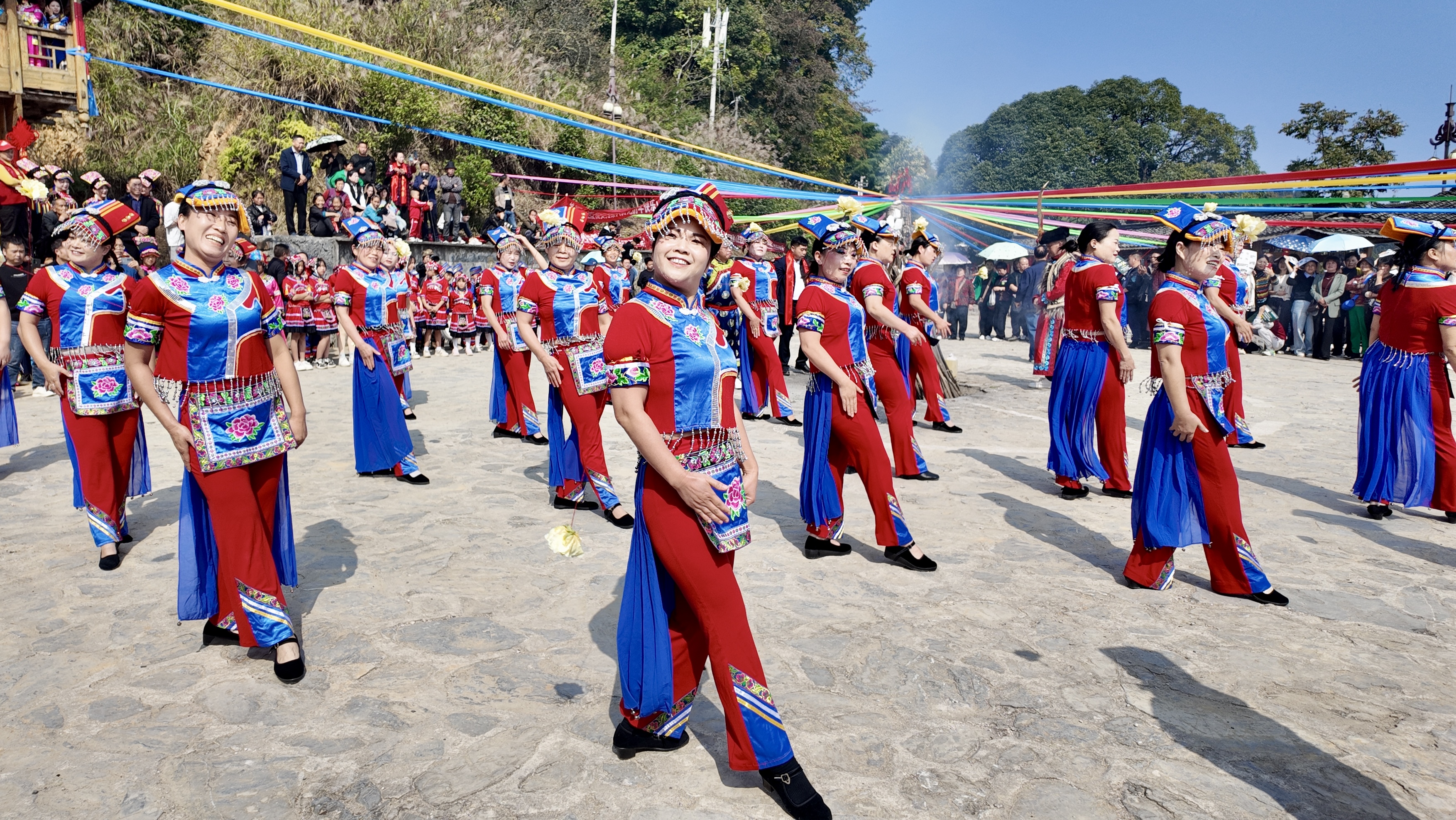 People of the Qiang ethnic group dressed in traditional costumes celebrate the Qiang New Year in a village in Jiangkou County, Tongren City, Guizhou Province, November 1, 2024. /Provided to CGTN