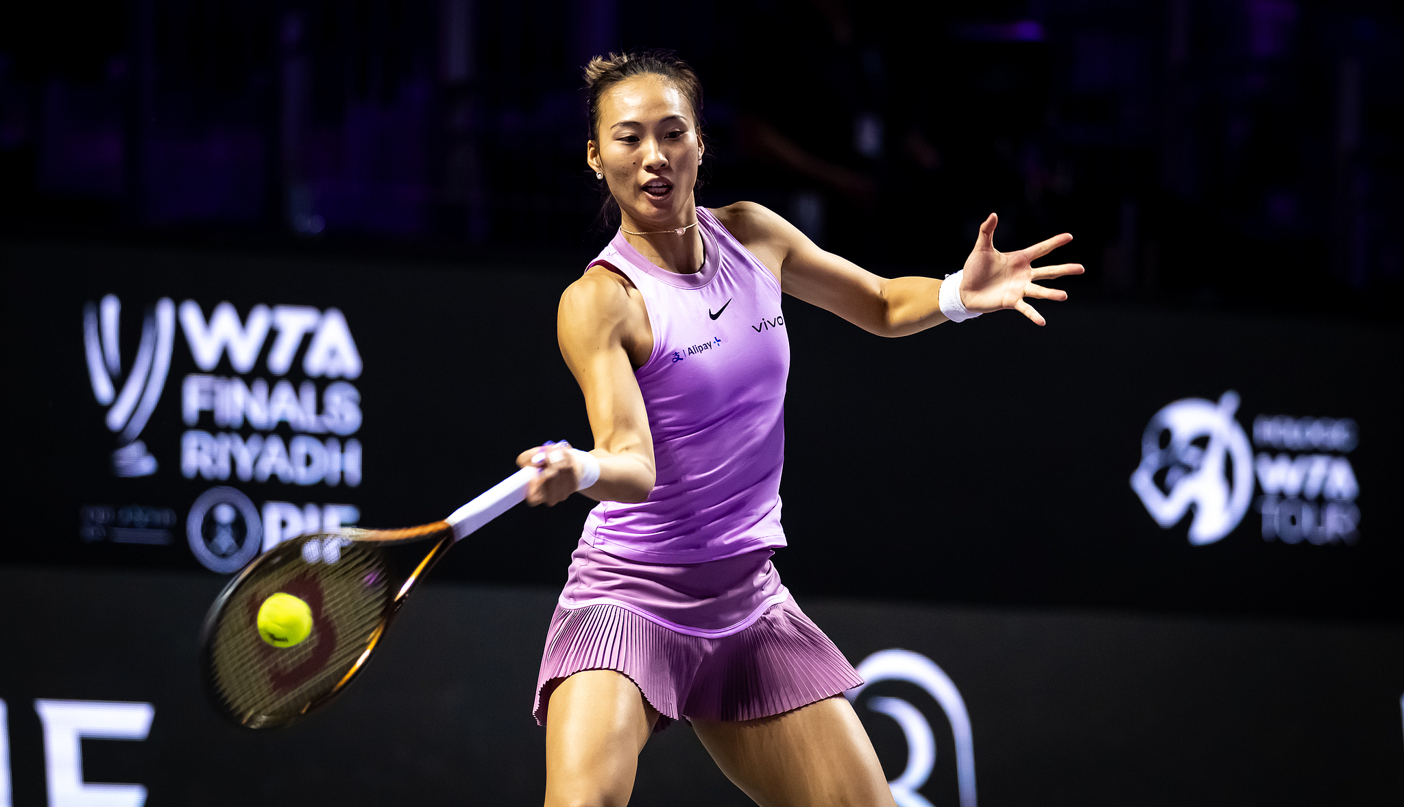 Zheng Qinwen of China hits a shot against Elena Rybakina of Kazakhstan in a Purple Group women's singles match at the Women's Tennis Association (WTA) Finals in Riyadh, Saudi Arabia, November 4, 2024. /CFP