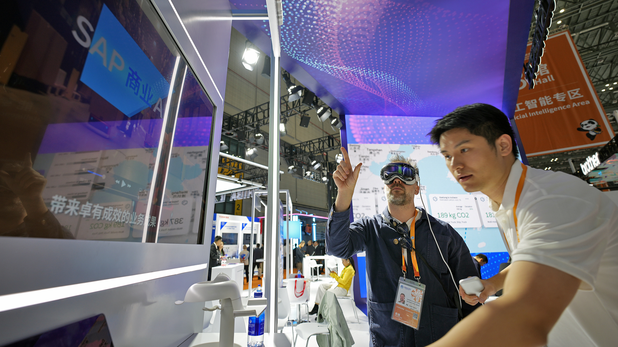 Visitors experience the artificial intelligence product using AR technology during the seventh China International Import Expo in east China's Shanghai, November 6, 2024. /CFP