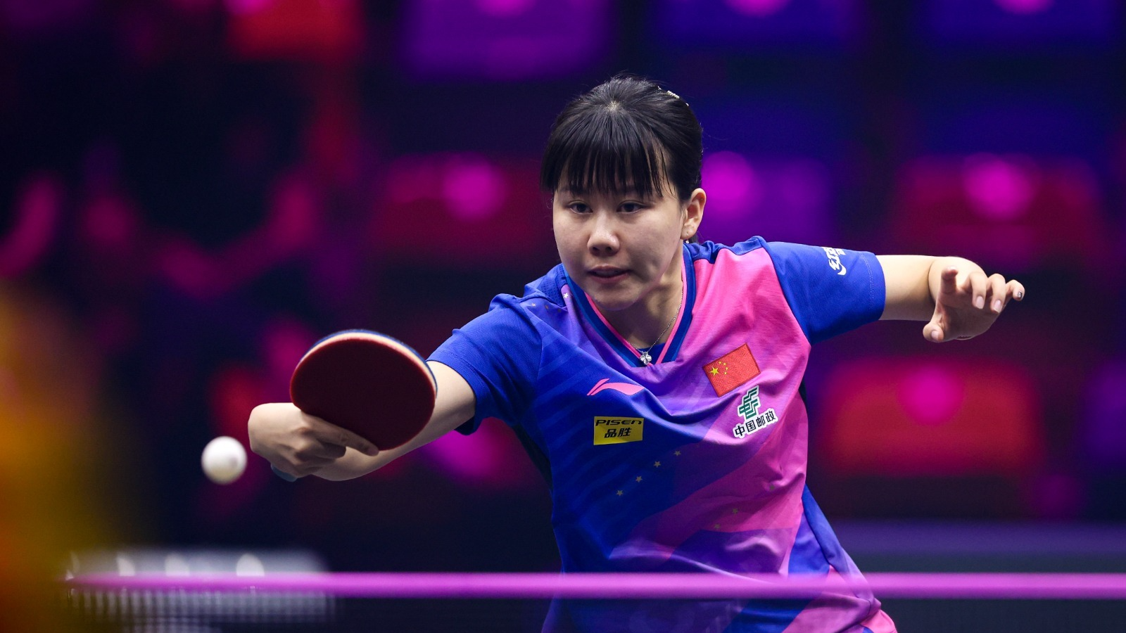 Chen Xingtong of China hits a shot in the women's singles match against Bernadette Szocs of Romania at the World Table Tennis (WTT) Champions Frankfurt in Frankfurt, Germany, November 6, 2024. /WTT