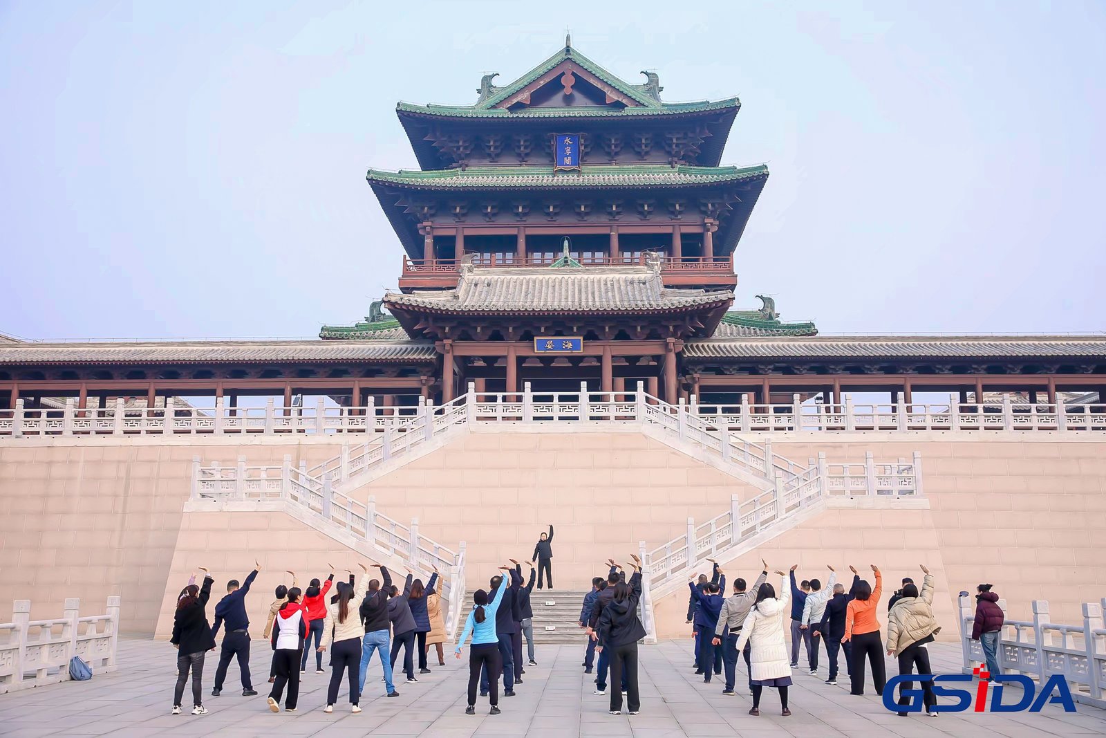 Guests of the Global South I-Dialogue on Agriculture conference partake in a traditional Chinese health and fitness exercise 