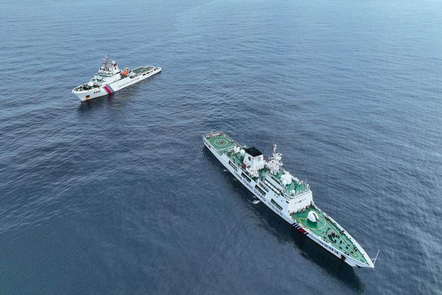 The China Coast Guard (CCG) vessel Huayang conducts a drill with another CCG vessel in the South China Sea, May 21, 2024. /Xinhua