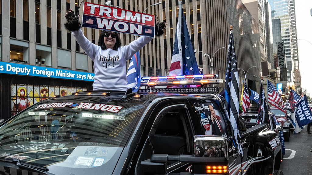 People participate in a car caravan in support of US President-elect Donald Trump on November 9, 2024. /CFP