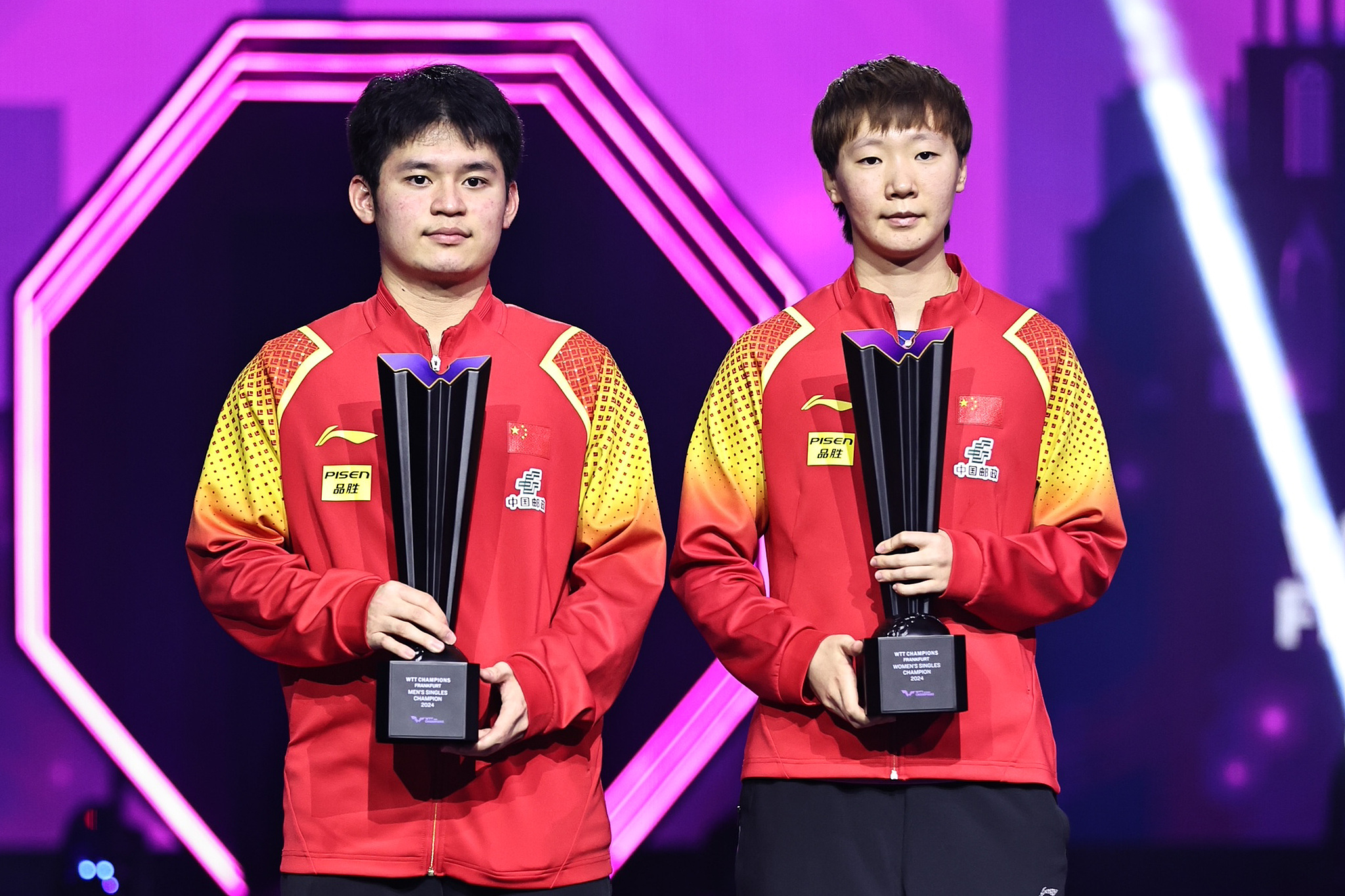 Lin Shidong (L) and Wang Manyu of China win the men's and the women's singles titles respectively at the World Table Tennis (WTT) Champions Frankfurt in Frankfurt, Germany, November 10, 2024. /CFP