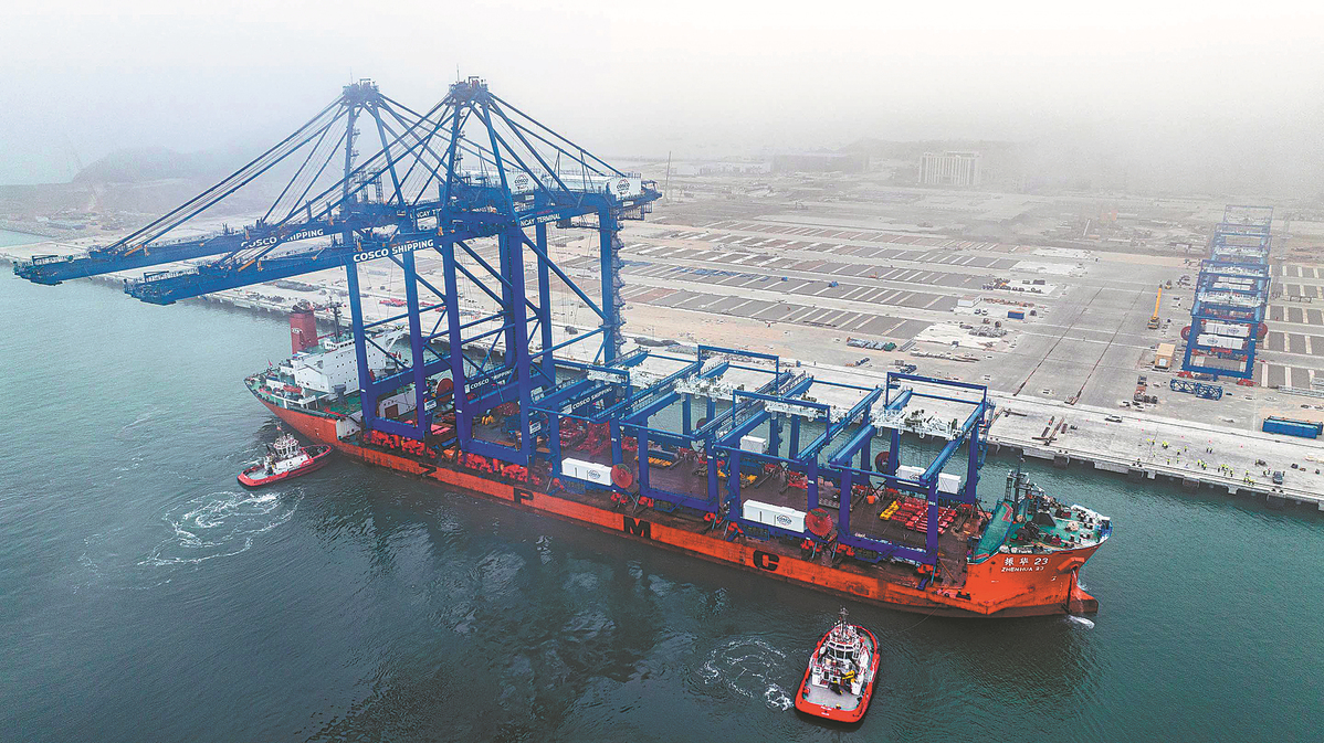 Container cranes and rail-mounted gantry cranes shipped from China arrive at the Chancay Port in Peru, June 27, 2024. / Xinhua