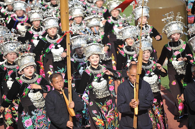 People of the Miao ethnic group take part in a parade to celebrate the Miao New Year in Rongjiang county, Guizhou province, November 6, 2024. /CFP