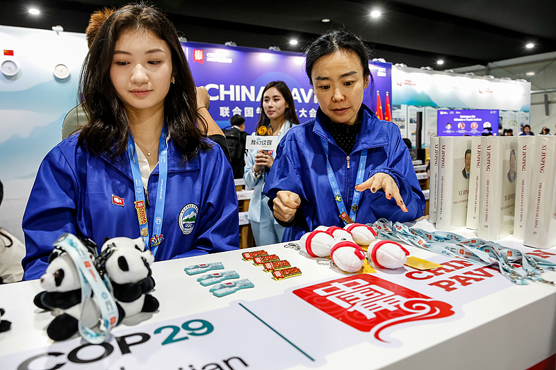 Hostesses stand at the China Pavilion during the first day of the 29th session of the Conference of the Parties to the United Nations Framework Convention on Climate Change, or COP29, in Baku, Azerbaijan, November 11, 2024. /CFP