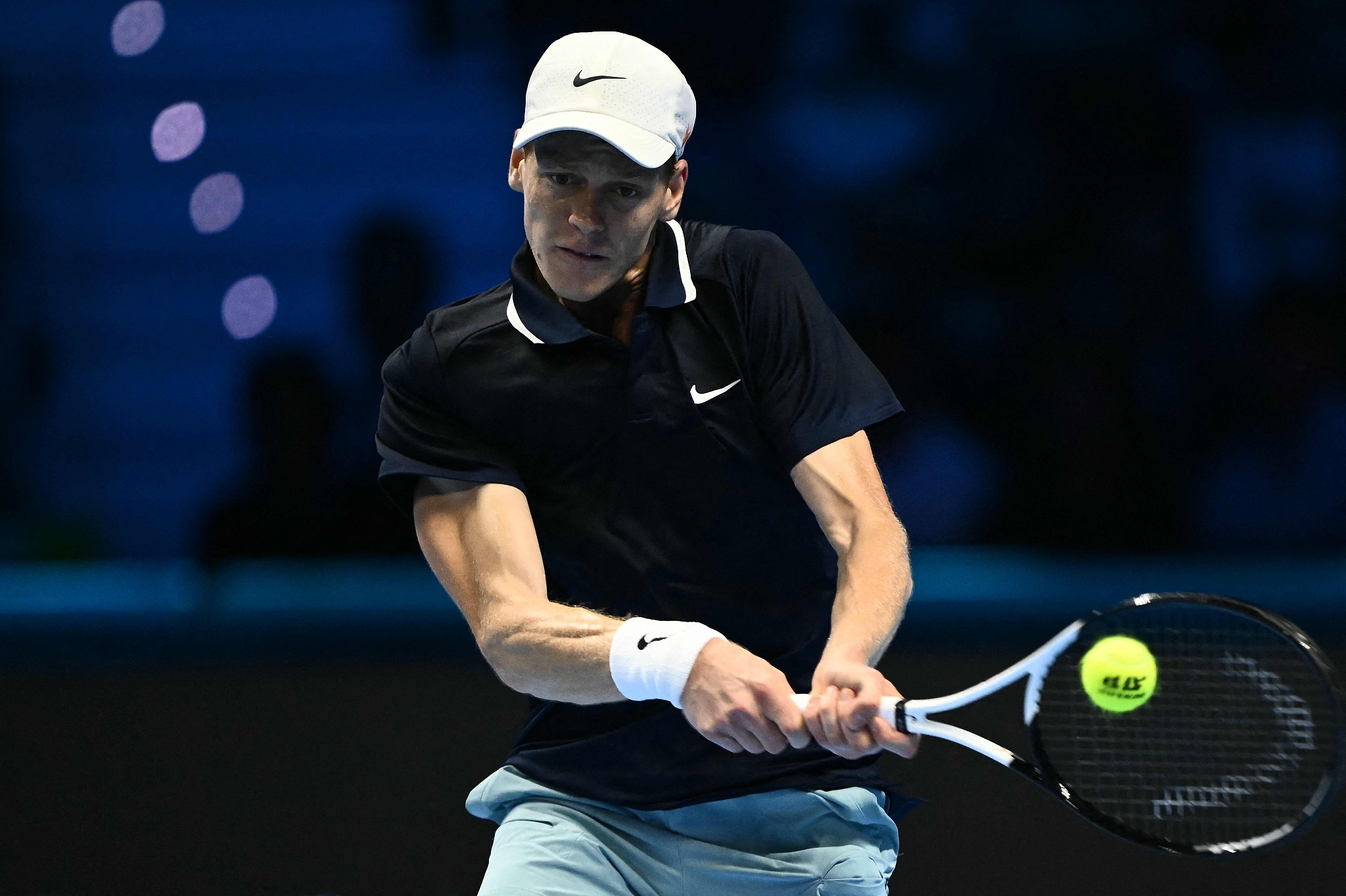 Jannik Sinner of Italy hits a shot in the men's singles match against Taylor Fritz of the U.S. at the Association of Tennis Professionals (ATP) Finals in Turin, Italy, November 12, 2024. /CFP