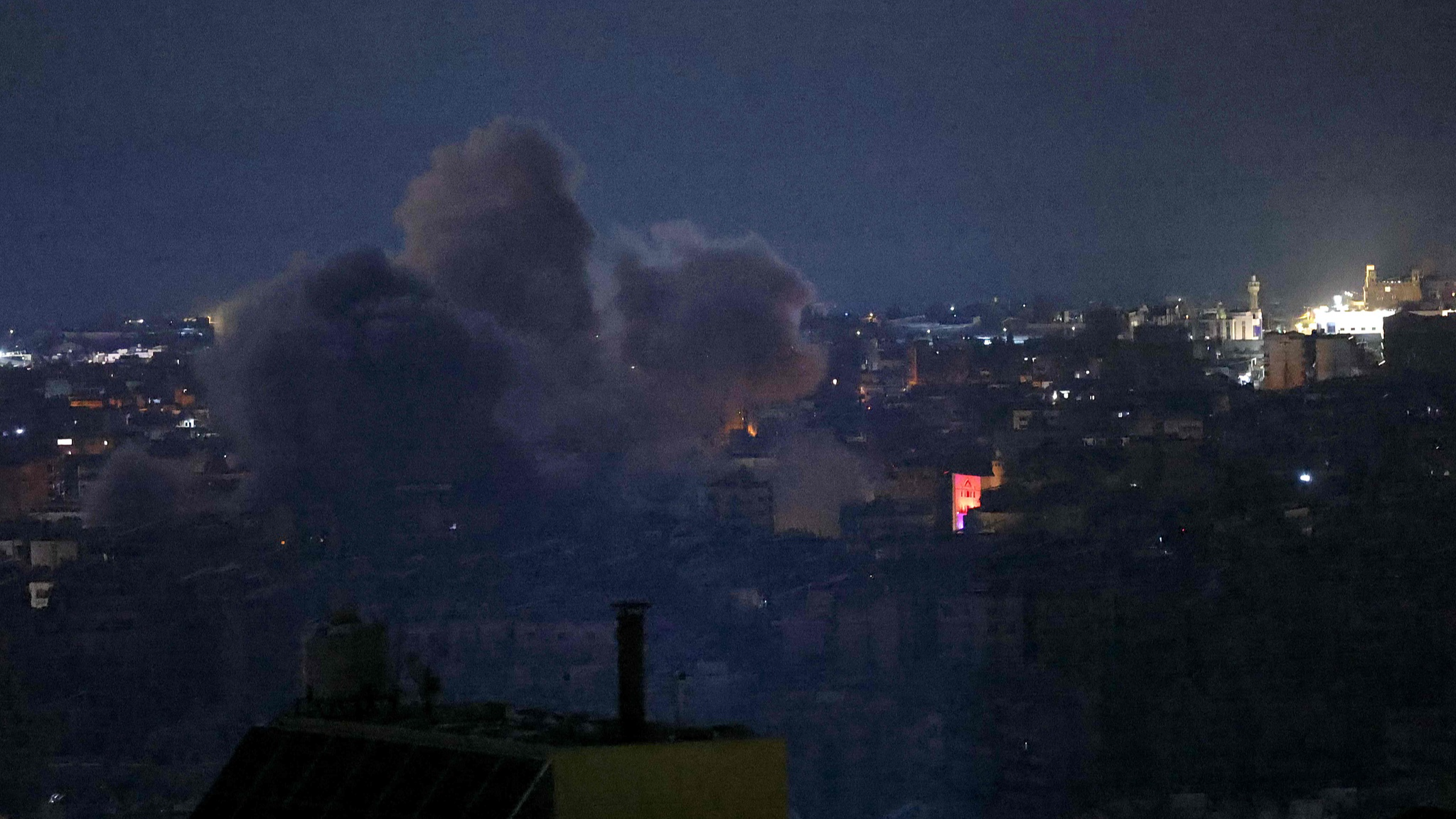 Smoke rises from the site of an Israeli air strike targeting a neighborhood in southern Beirut, Lebanon, November 14, 2024. /CFP