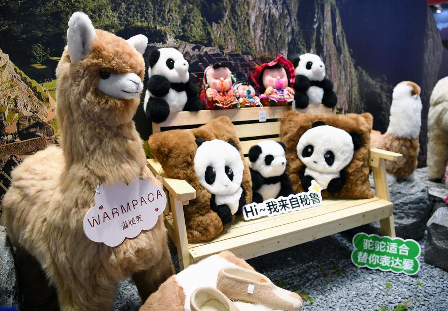 The booth of Warmpaca, a Peruvian brand, is pictured during the seventh China International Import Expo in east China's Shanghai, November 5, 2024. /Xinhua