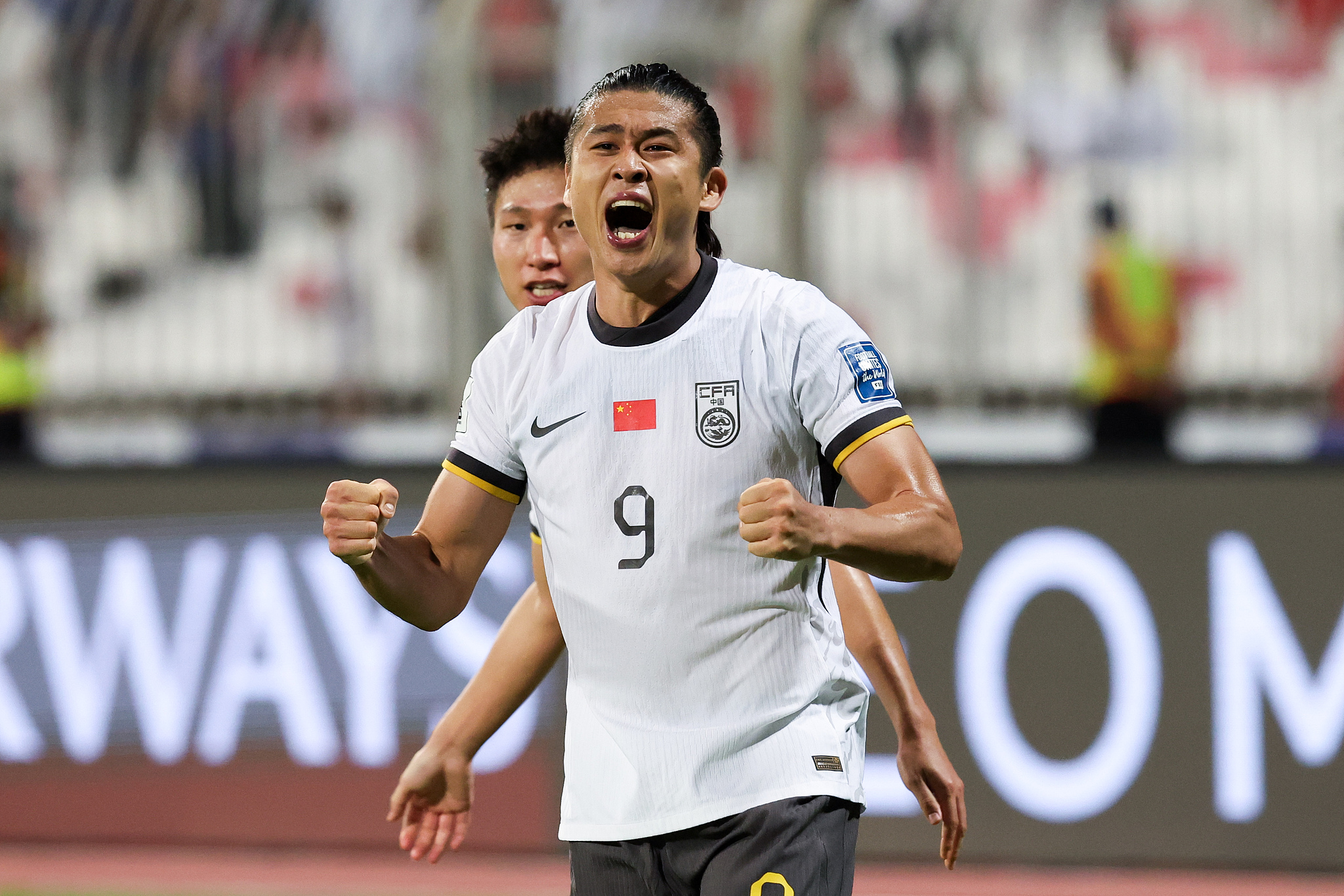 Zhang Yuning (#9) of China celebrates after scoring a goal against Bahrain in a 2026 FIFA World Cup Asian Football Confederation (AFC) Qualifying Tournament game in Manama, Bahrain, November 14, 2024. /CFP