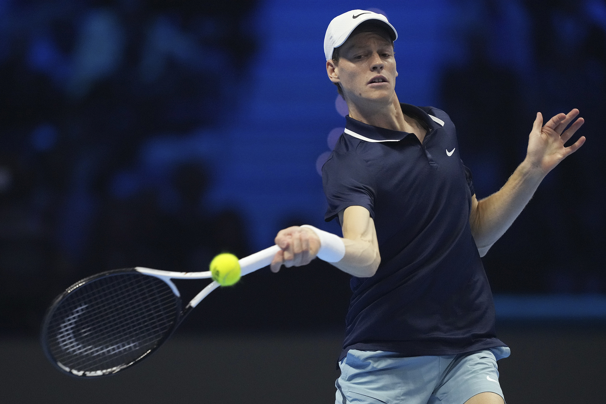 Jannik Sinner of Italy hits a shot against Daniil Medvedev of Russia in a men's singles match at the Association of Tennis Professionals (ATP) Finals in Turin, Italy, November 14, 2024. /CFP