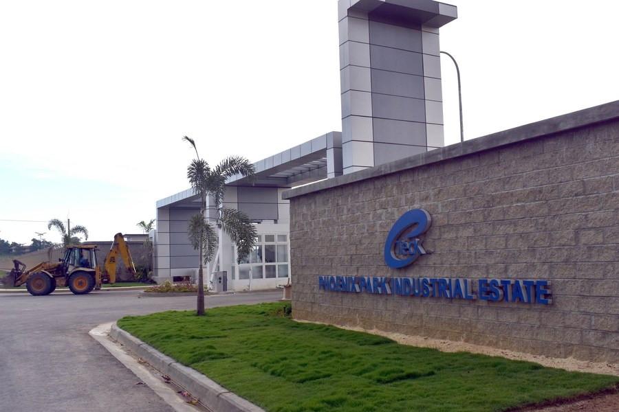 File photo shows the main entrance of a factory in the modern Phoenix Park Industrial Estate, built by the Chinese company Beijing Construction Engineering Group (BCEG), in Trinidad and Tobago. /Xinhua