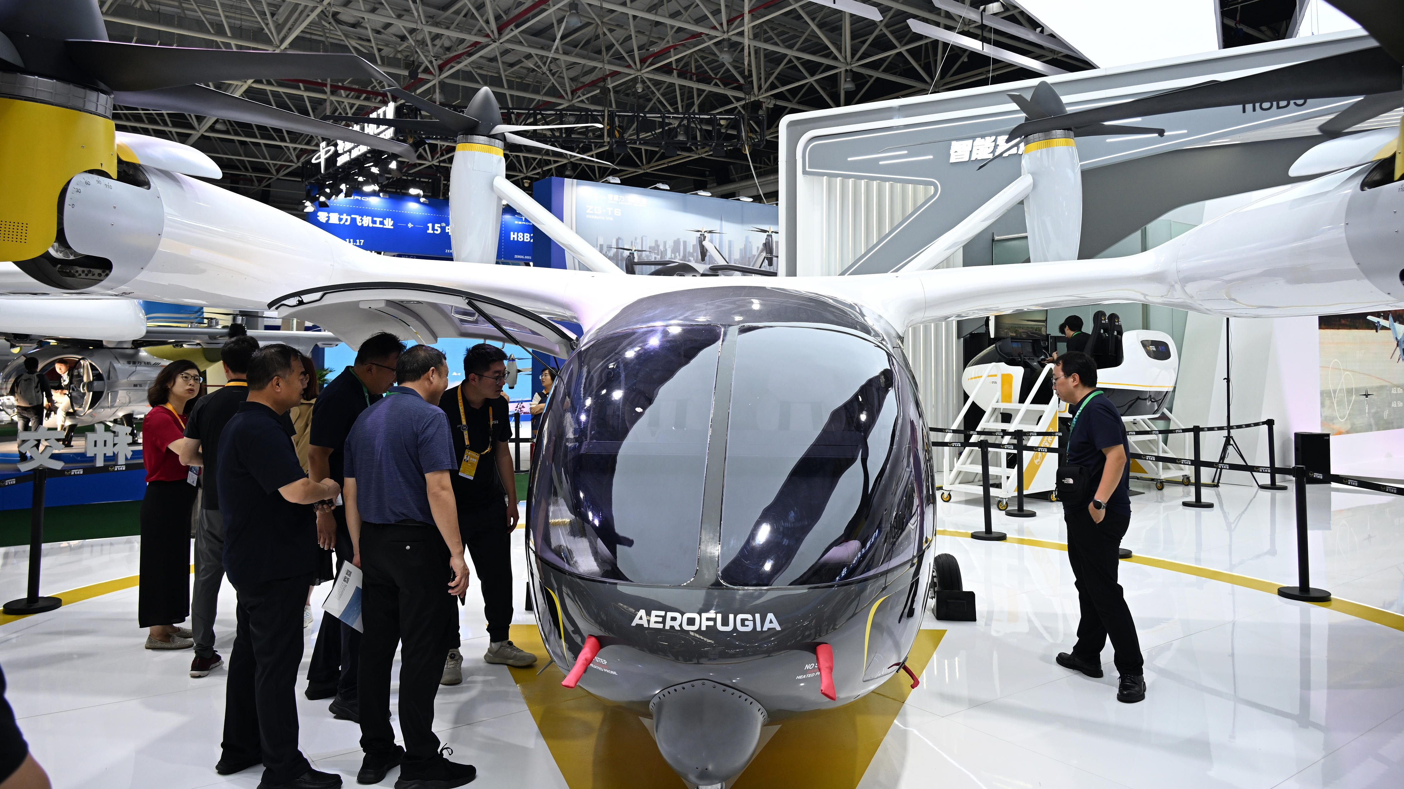 Visitors are seen at the low-altitude economy pavilion at the 15th China International Aviation and Aerospace Expo in Zhuhai, south China's Guangdong Province, November 14, 2024. /CFP