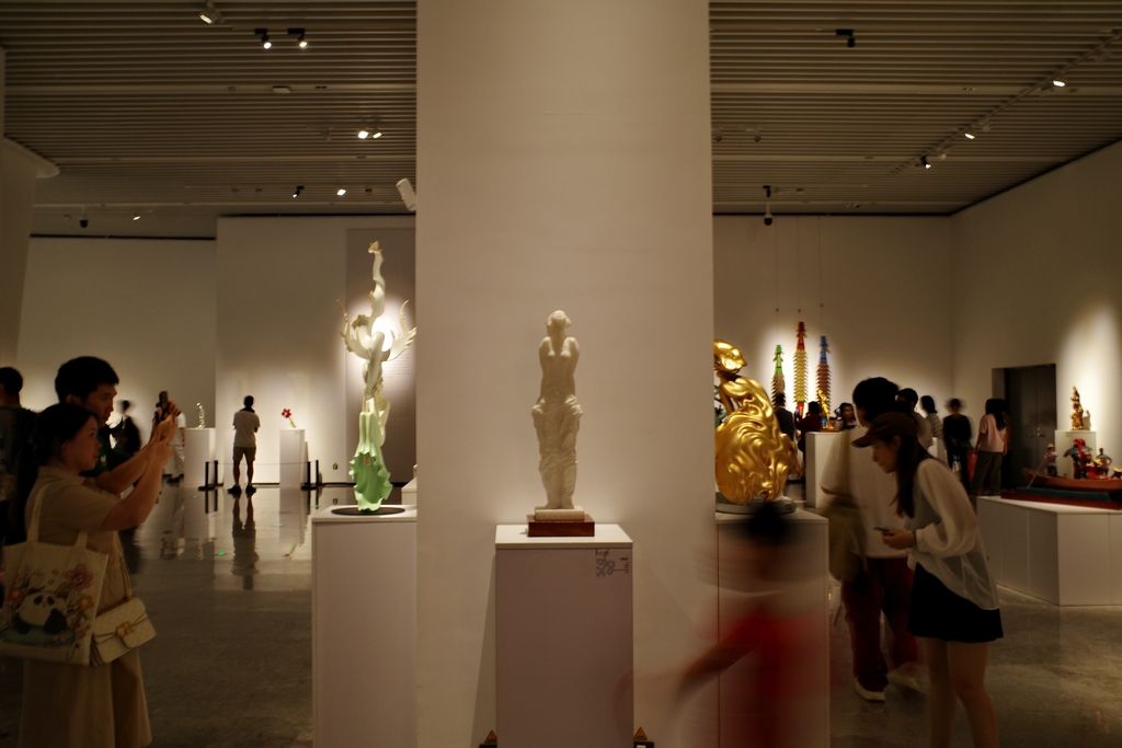 Sculptures are seen on display at the 