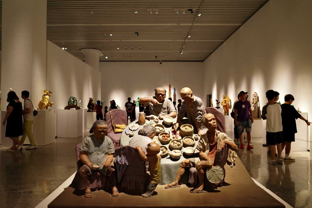 Sculptures are seen on display at the 