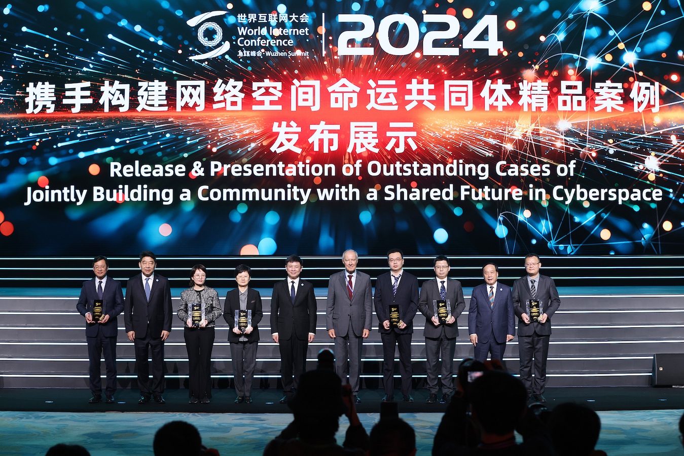 Trophies are awarded to the representatives of the outstanding cases at the Release and Presentation of Outstanding Cases of Jointly Building a Community with a Shared Future in Cyberspace, Wuzhen, Zhejiang Province, east China, November 19, 2024. /CFP