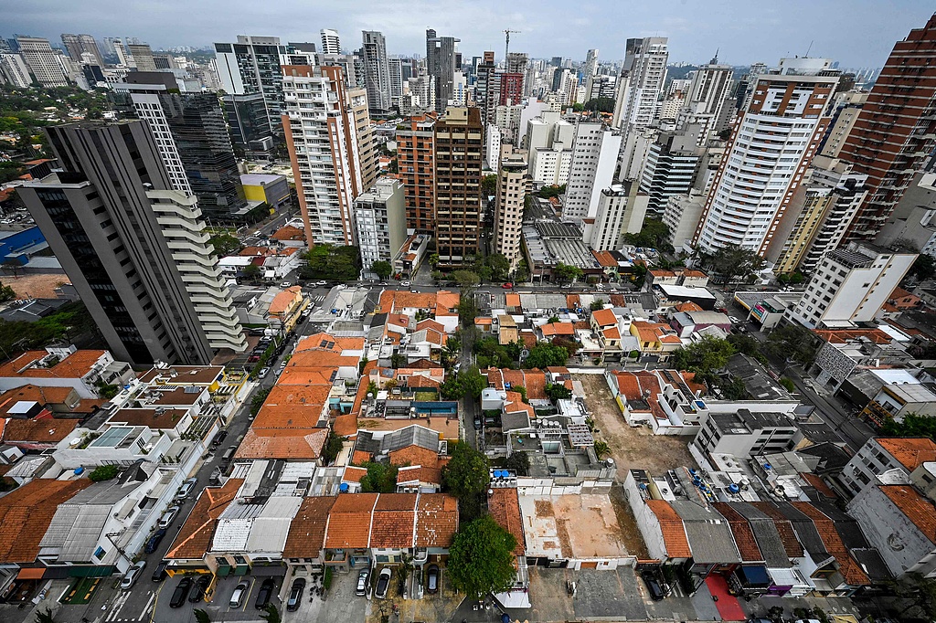 Aerial view of houses surrounded by buildings in the Pinheiros, Sao Paulo, Brazil, on September 5, 2023. /CFP