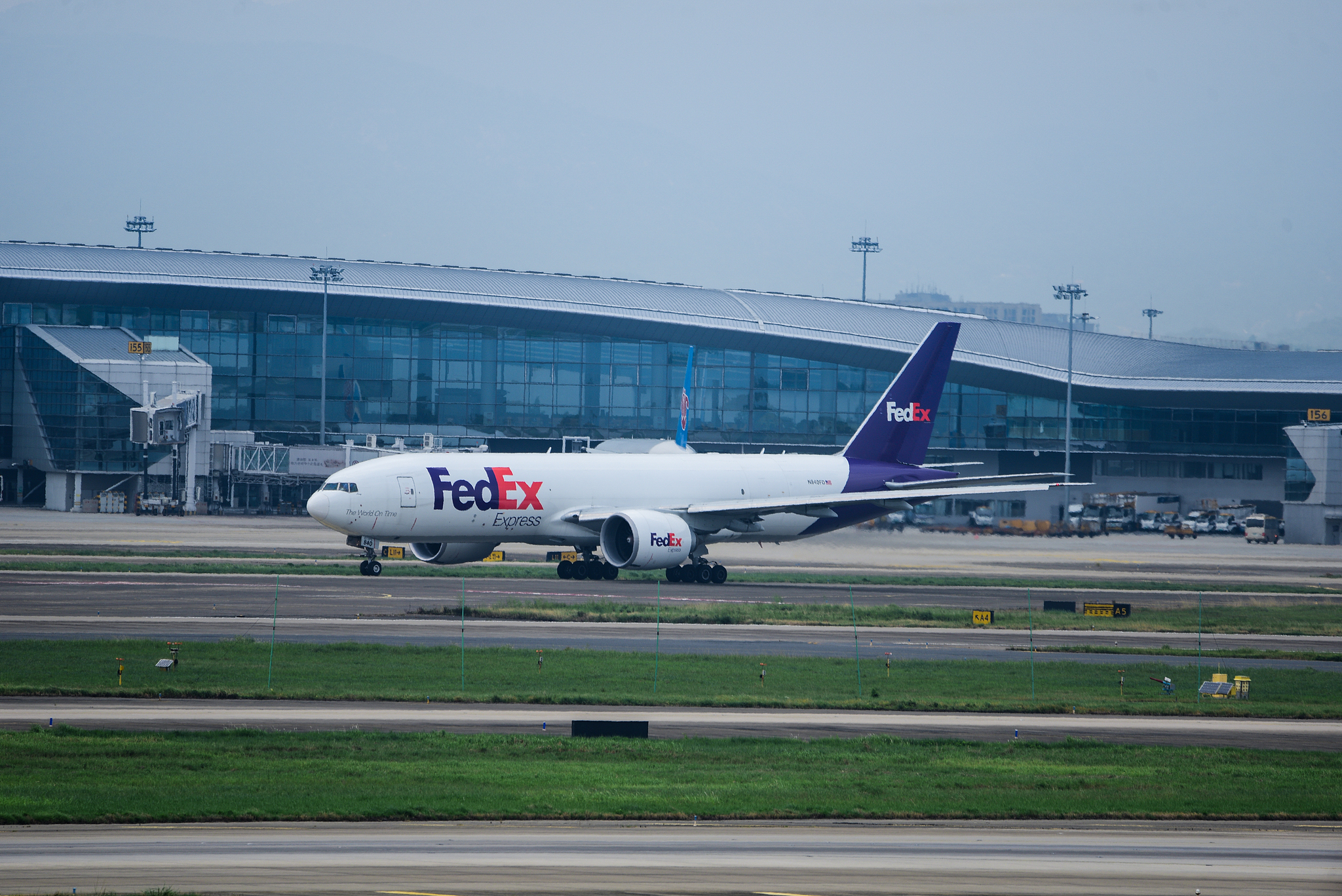 A FedEx Boeing 777 freighter lands at an airport in China. /CFP