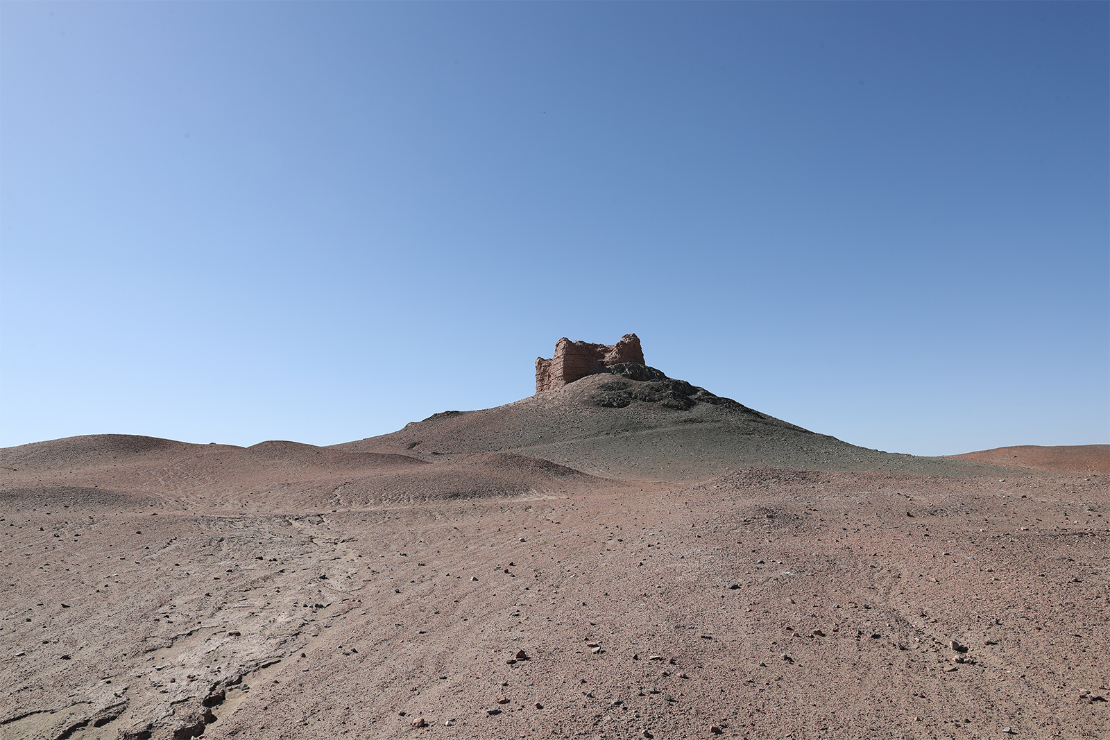 A beacon tower built more than 2,000 years ago is seen at the Yangguan Scenic Area in Dunhuang, Gansu Province. The remaining tower stands 4.7 meters high, with the remnants of the fort, the stable, and an ash heap still visible in its southwest corner. /CGTN