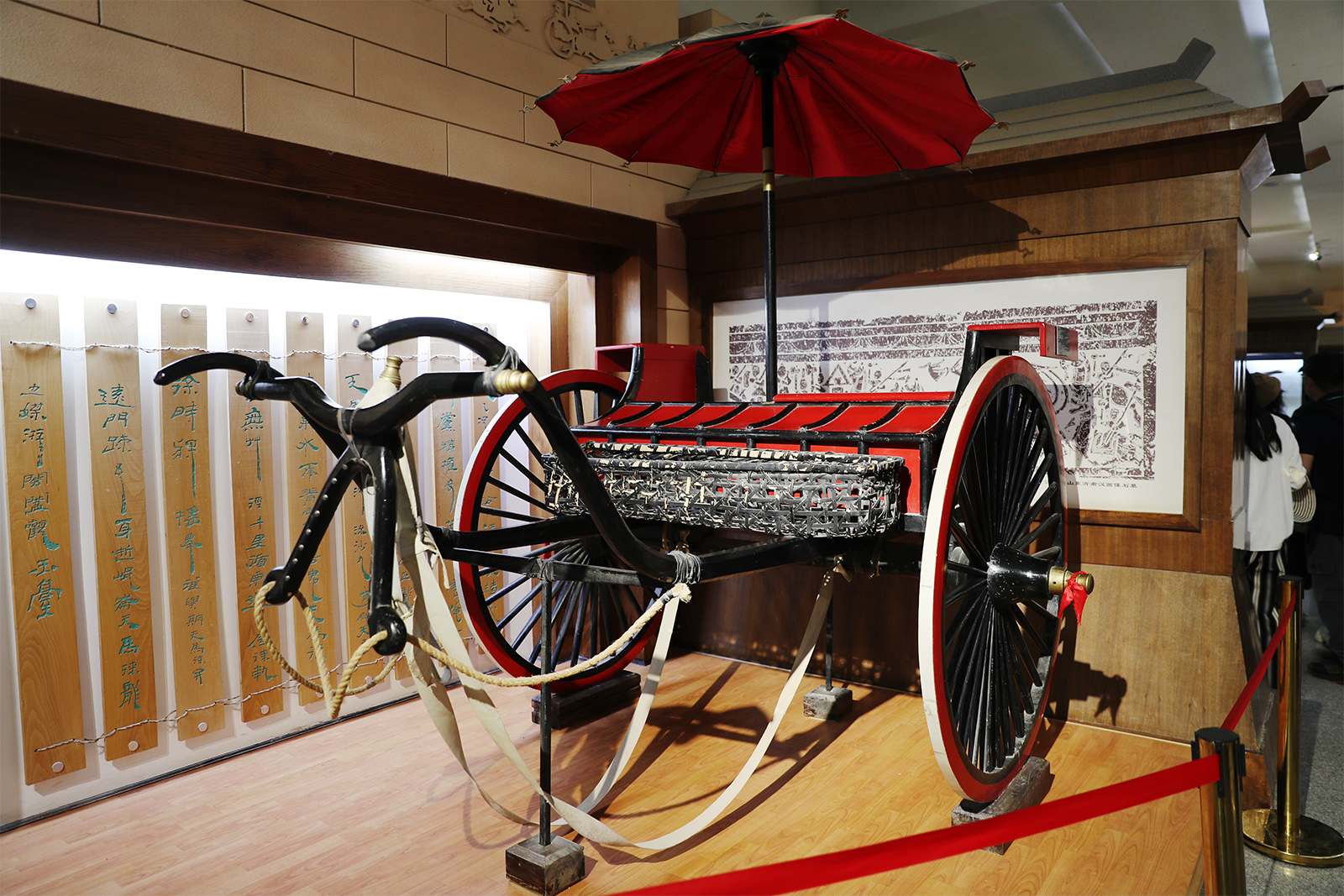 A replica of an ancient carriage is on display at the Yangguan Museum at the Yangguan Scenic Area in Dunhuang, Gansu Province. /CGTN