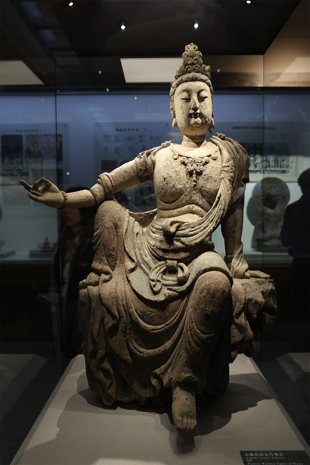 A painted wooden figure of Water-Moon Guanyin dating to the Liao and Jin Dynasties (907-1234) is on display at the Yangguan Museum at the Yangguan Scenic Area in Dunhuang, Gansu Province. /CGTN