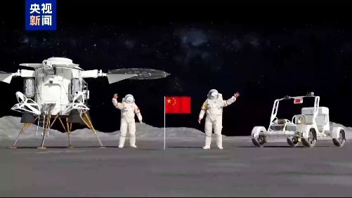 The video shows a lunar lander and a rover with two astronauts at the center. /China Media Group