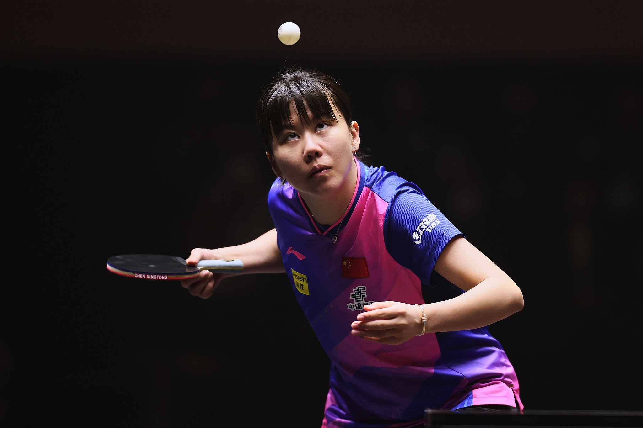 Chen Xingtong of China hits a shot in the women's singles match against Sun Yingsha of China in Fukuoka, Japan, November 21, 2024. /CFP