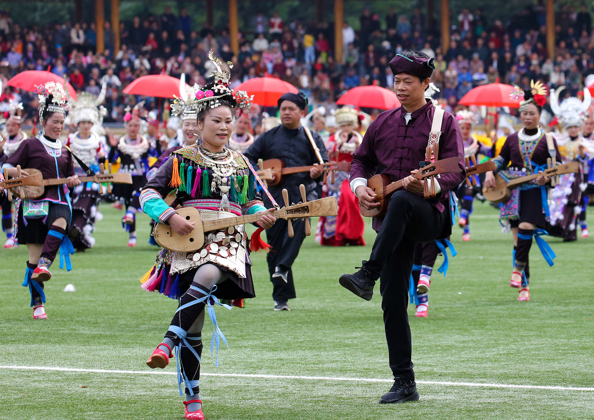 People perform at the opening ceremony of this year's Lusheng and Horse Fighting Festival in Rongshui Miao Autonomous County of Liuzhou, Guangxi Zhuang Autonomous Region on November 23, 2024. /CFP