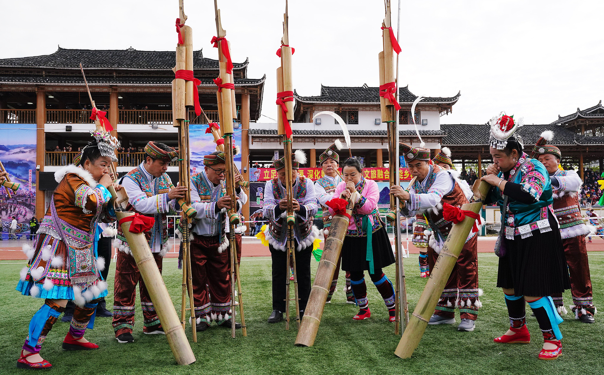 People play the lusheng at the opening ceremony of this year's Lusheng and Horse Fighting Festival in Rongshui Miao Autonomous County of Liuzhou, Guangxi Zhuang Autonomous Region on November 23, 2024. /CFP