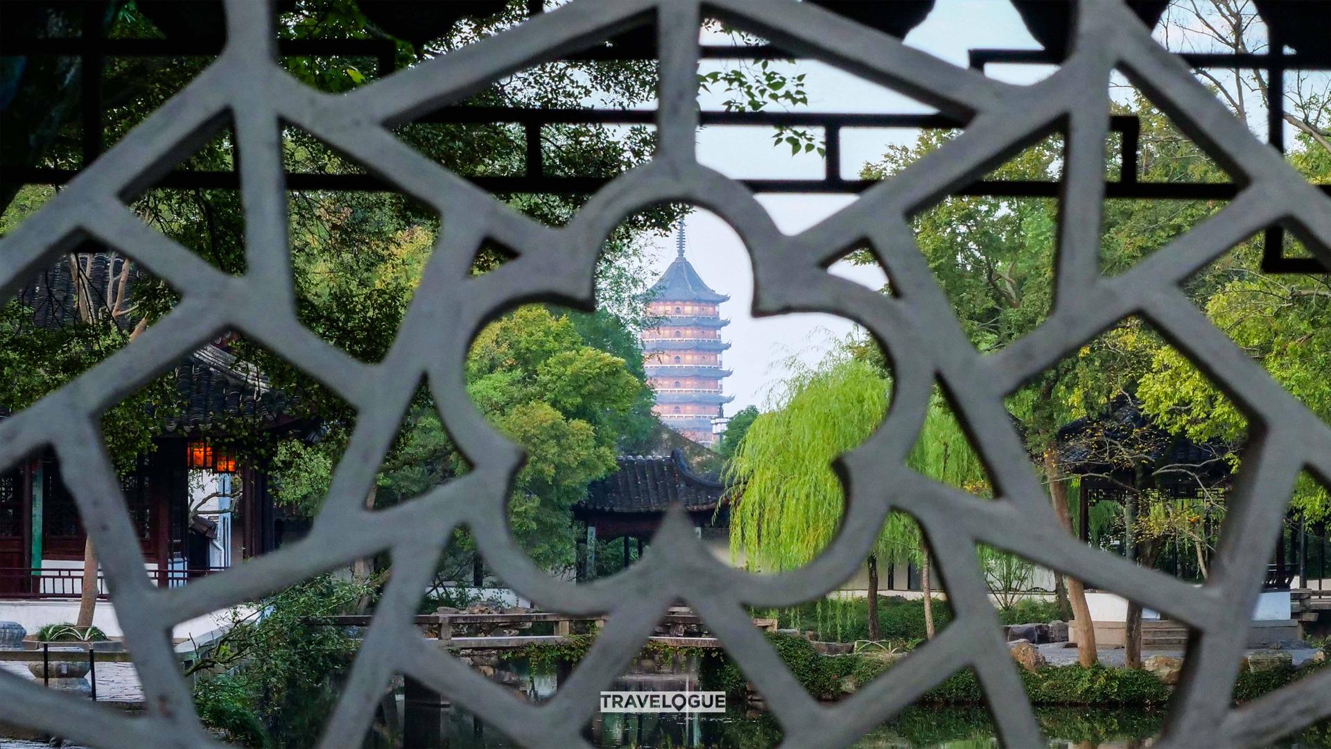 Window frames in Suzhou gardens add to the fun of sightseeing