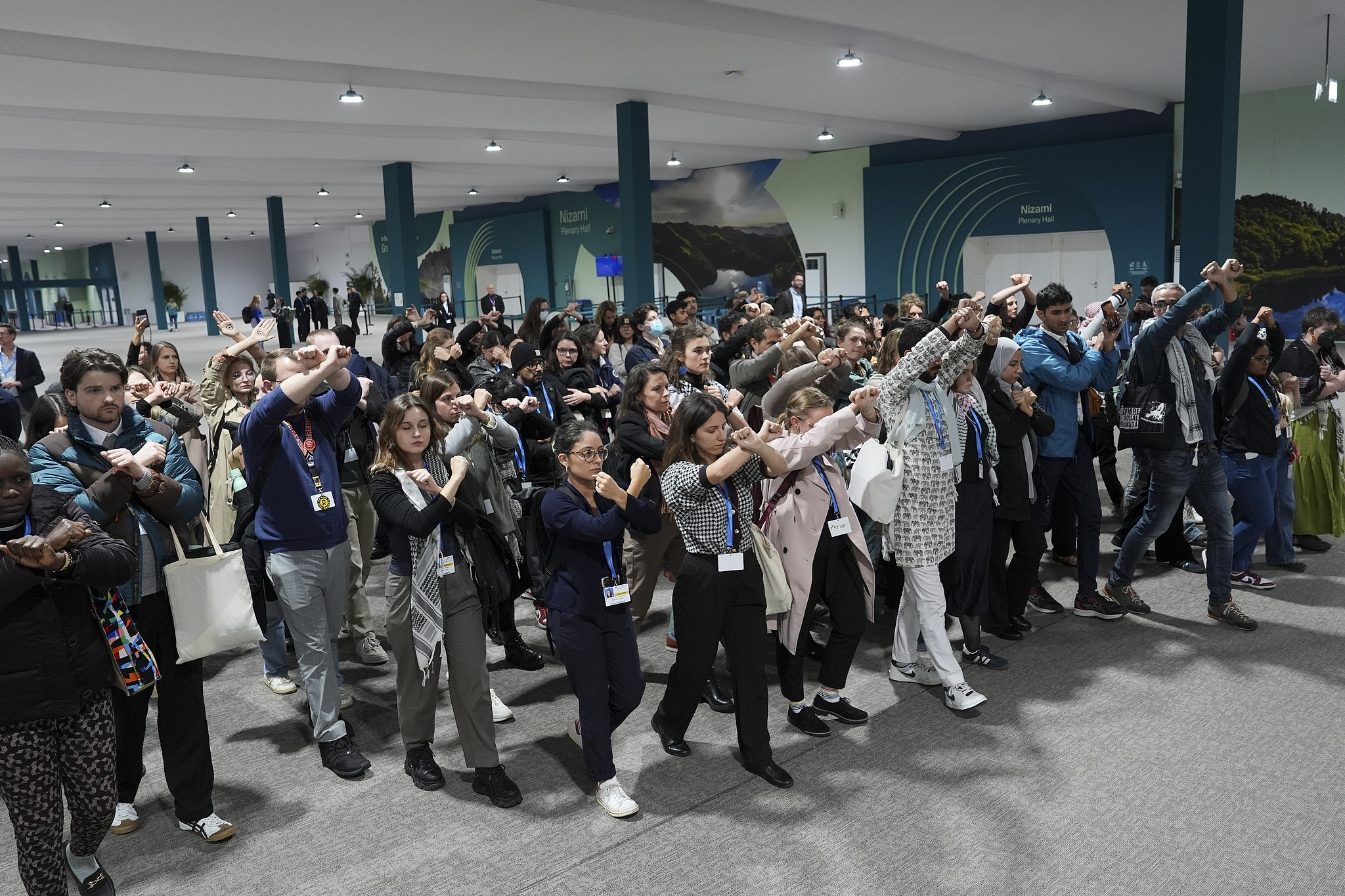 Activists demonstrate in silence against a draft of a proposed deal for curbing climate change at the 2024 UN Climate Change Conference (COP29), in Baku, Azerbaijan, November 22, 2024. /CFP