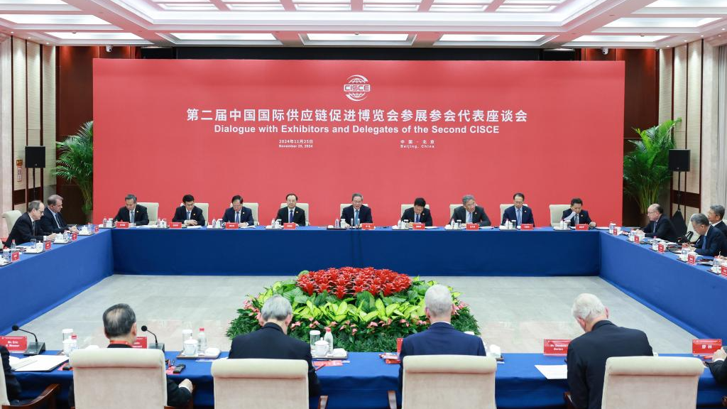 Chinese Premier Li Qiang attends a symposium with representatives of enterprises and organizations participating in the second China International Supply Chain Expo, Beijing, China, November 25, 2024. /Xinhua