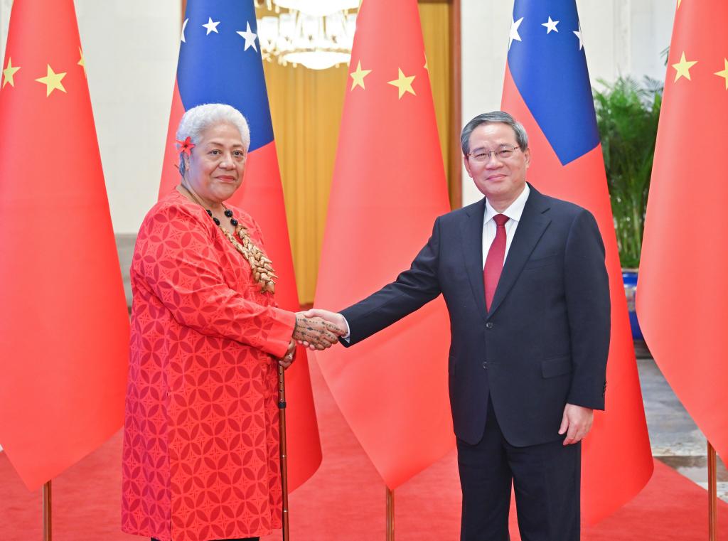 Chinese Premier Li Qiang meets Samoan Prime Minister Fiame Naomi Mata'afa at the Great Hall of the People in Beijing, capital of China, November 26, 2024. /Xinhua