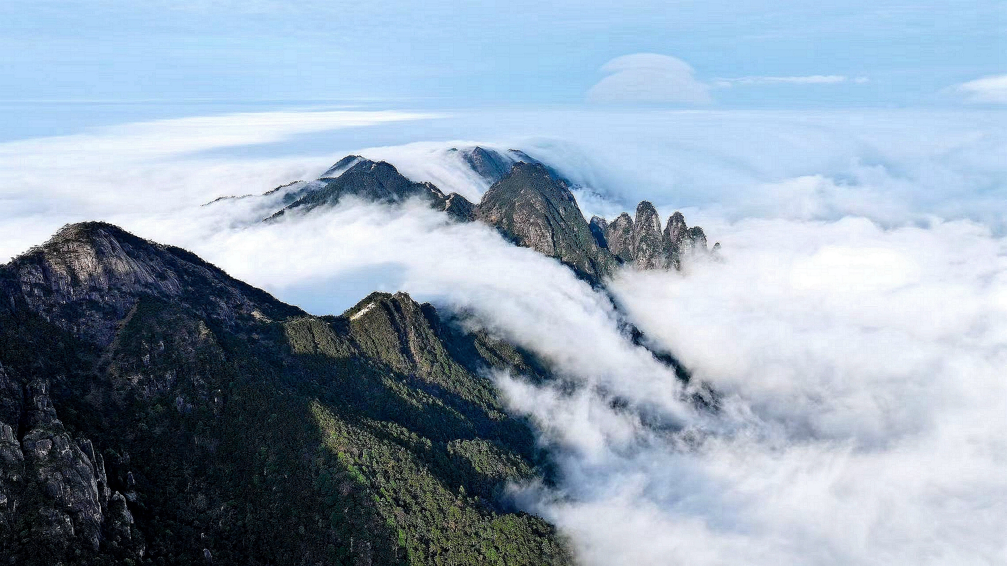 Mount Yingpan in Suichuan County, east China's Jiangxi Province is shrouded by thick clouds on November 26, 2024. /CFP