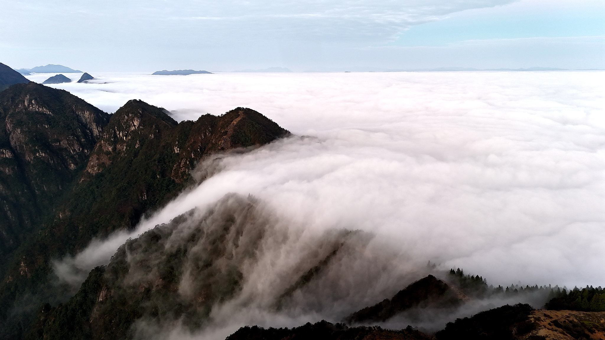 Mount Yingpan in Suichuan County, east China's Jiangxi Province is shrouded by thick clouds on November 26, 2024. /CFP