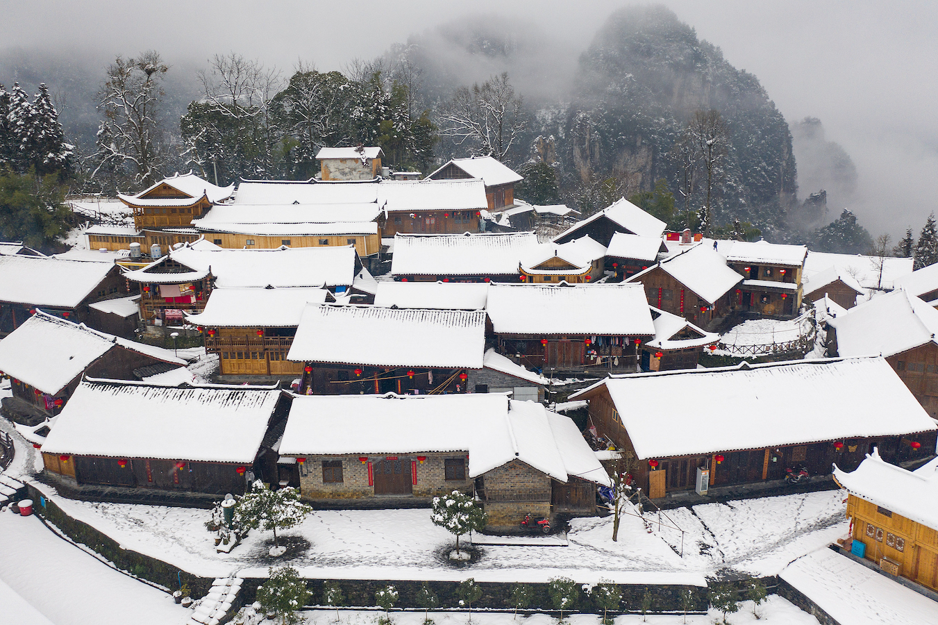 Shibadong Village in snow, February 2, 2022. /CFP