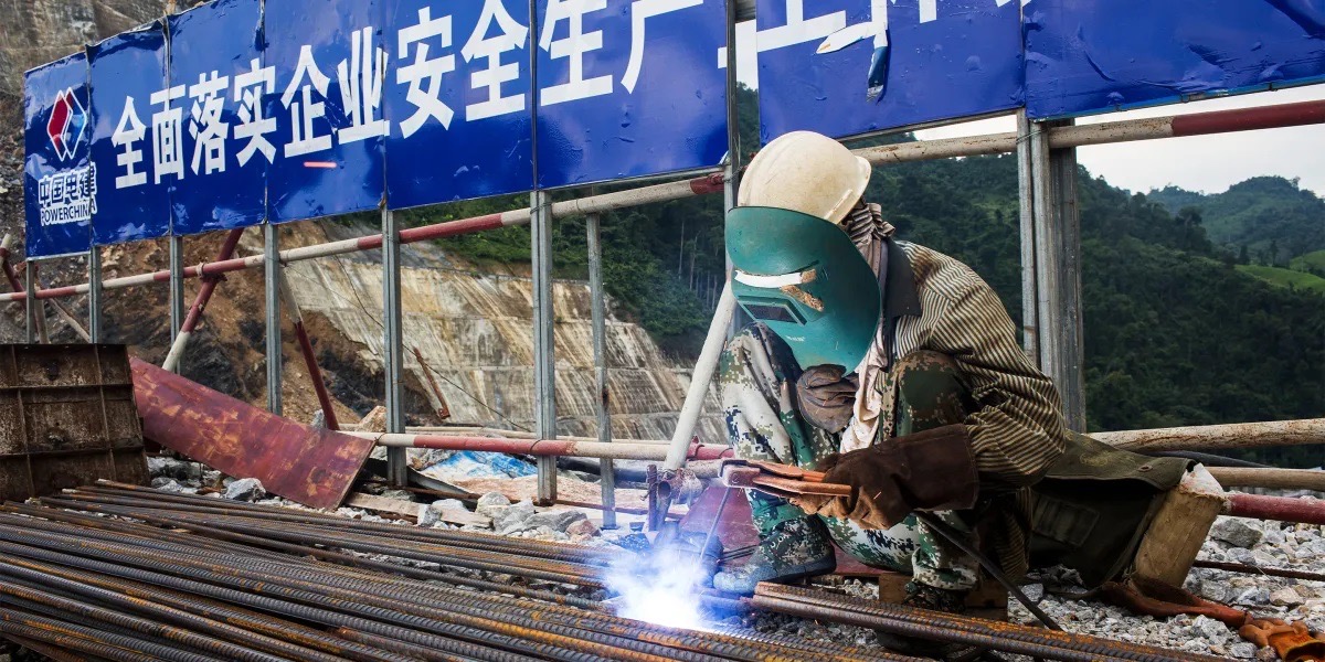 A PowerChina worker engages in welding operations. /PowerChina
