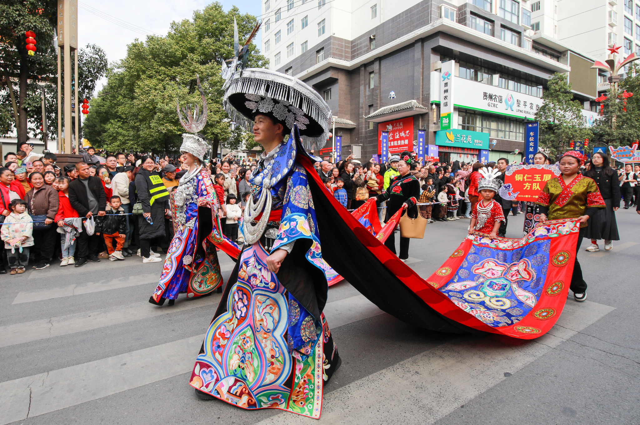 People dressed in traditional ethnic attire are captured during the grand parade celebrating the 2024 Dong New Year in Liping County, Guizhou Province, on December 1, 2024. /CFP