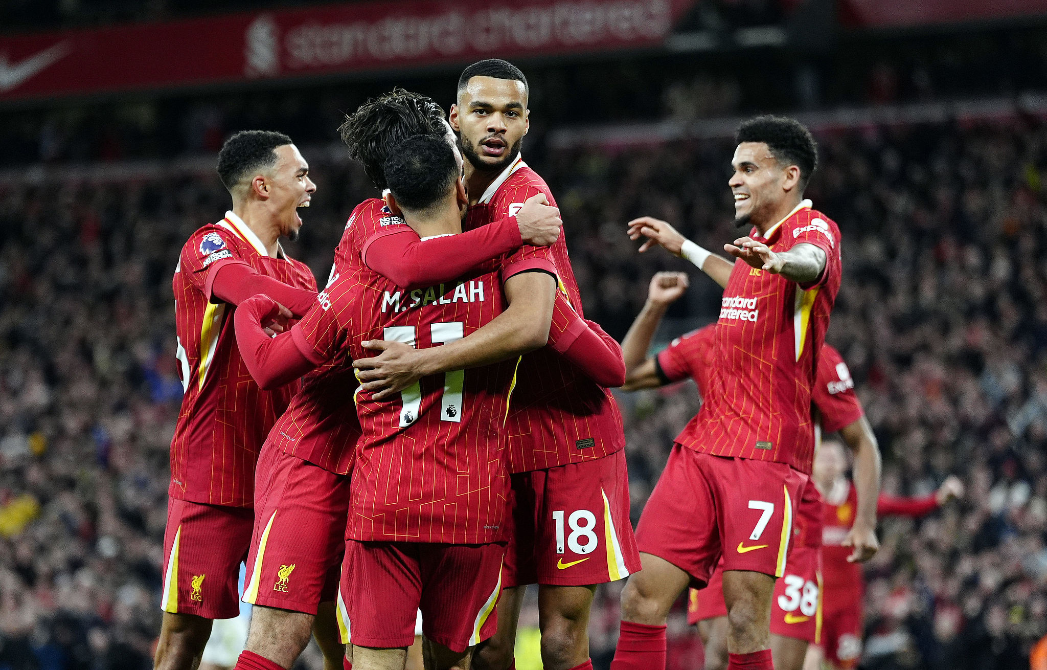 Liverpool players celebrate after scoring a goal in the Premmier League game against Manchester City at Anfield in Liverpool, England, December 1, 2024. /CFP