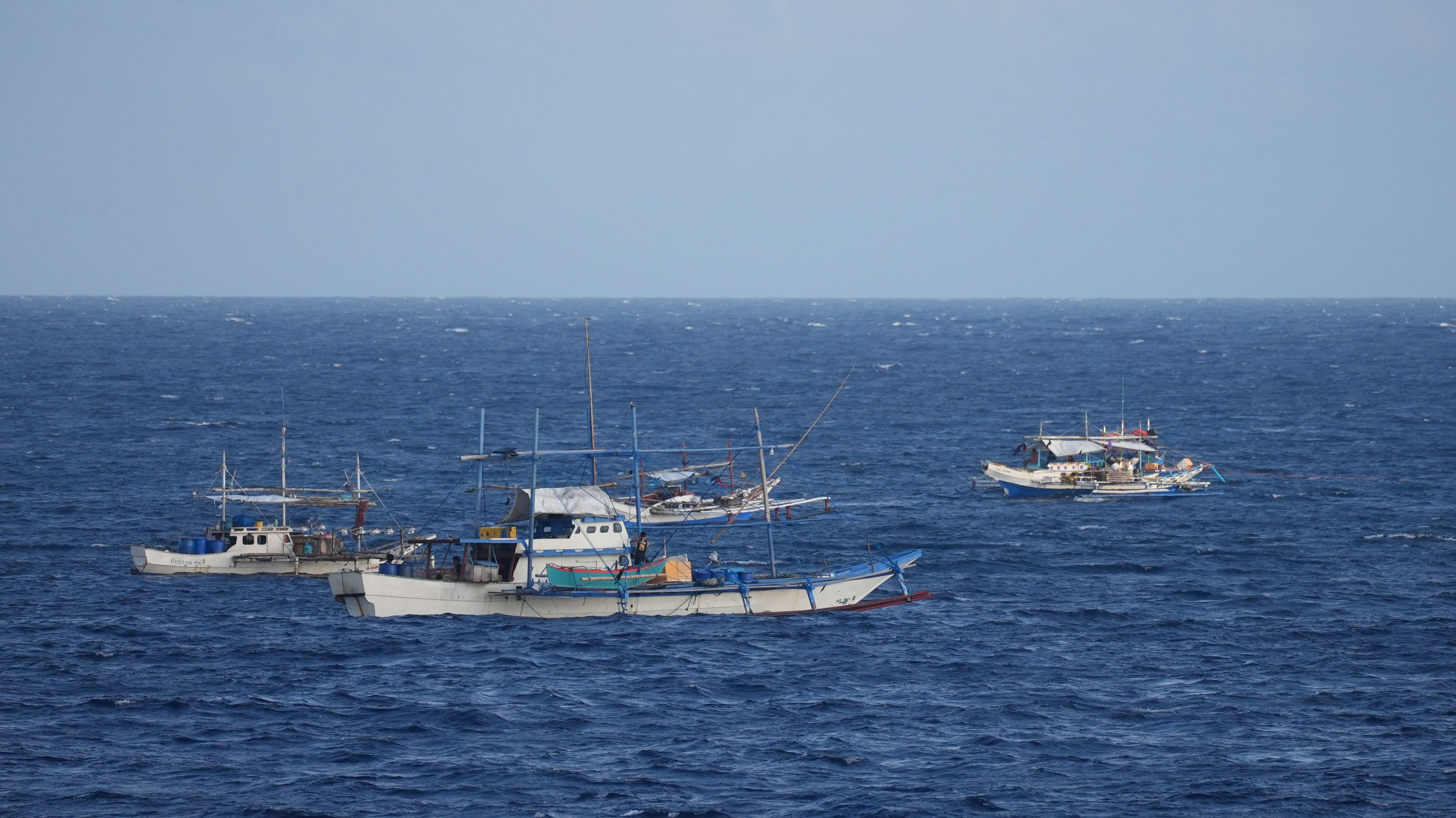 Philippine vessels illegally gathered in the name of fishing in the waters around Houteng Jiao in China's Nansha Qundao, November 26, 2024. Zhang Chao /CGTN