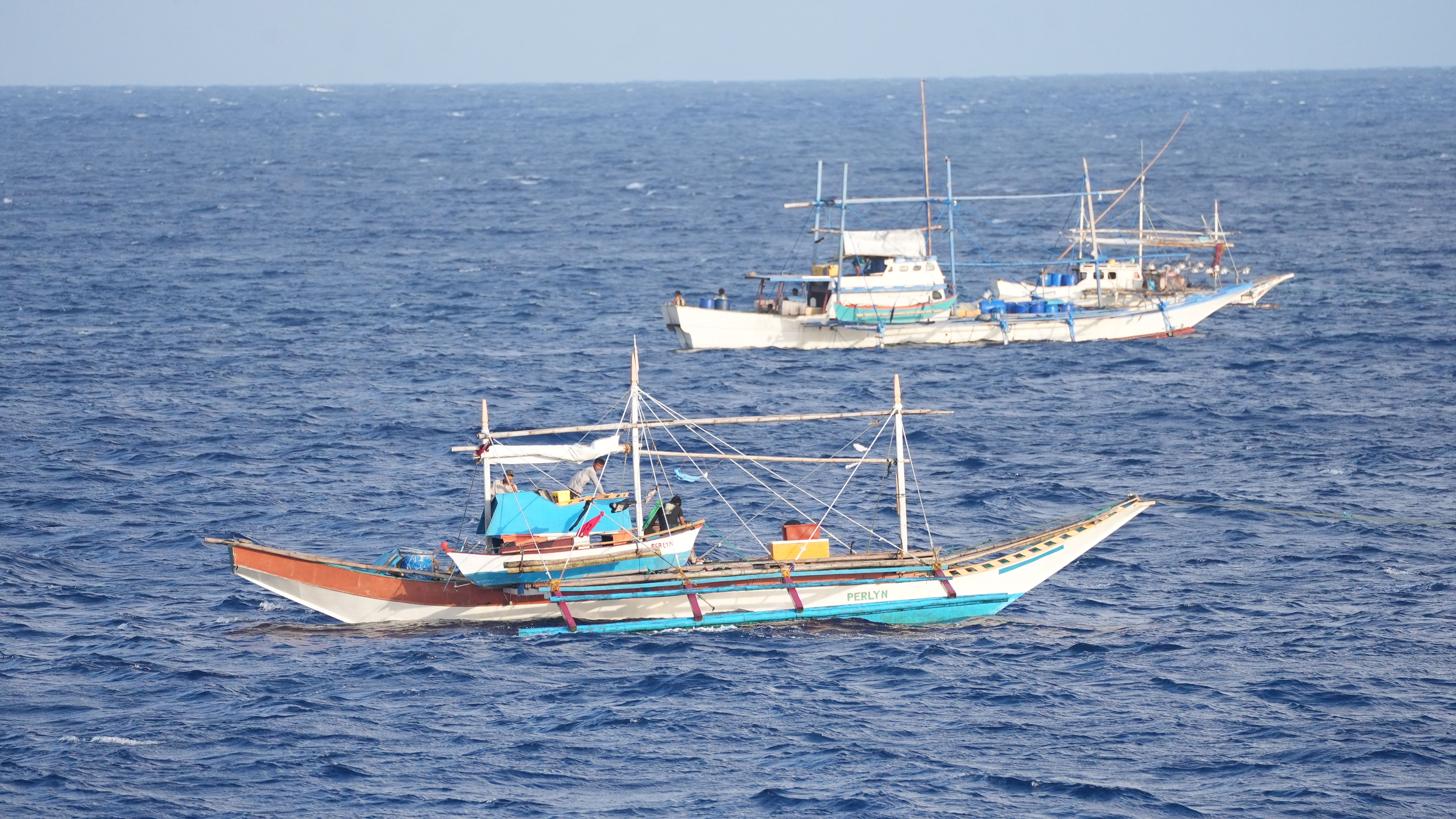 Philippine vessels illegally gathered in the name of fishing in the waters around Houteng Jiao in China's Nansha Qundao, November 26, 2024. Zhang Chao /CGTN