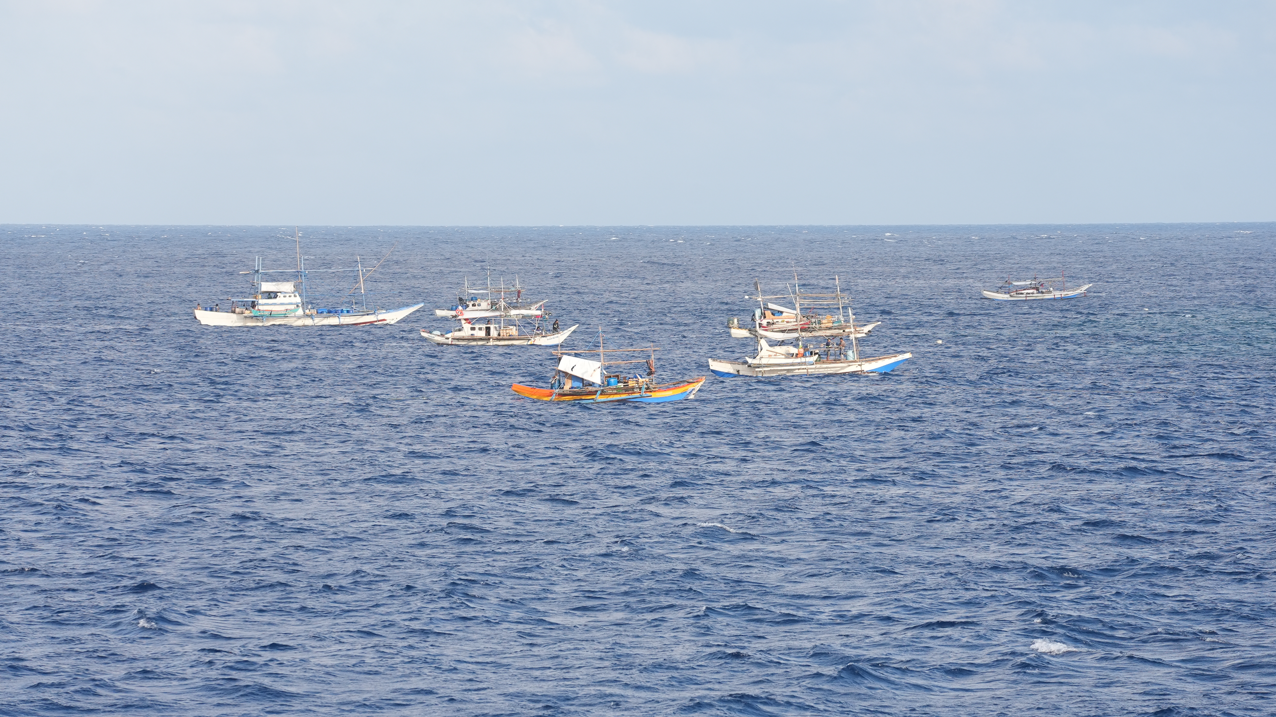 Philippine vessels illegally gathered in the name of fishing in the waters around Houteng Jiao in China's Nansha Qundao, November 26, 2024. Zhang Chao /CGTN