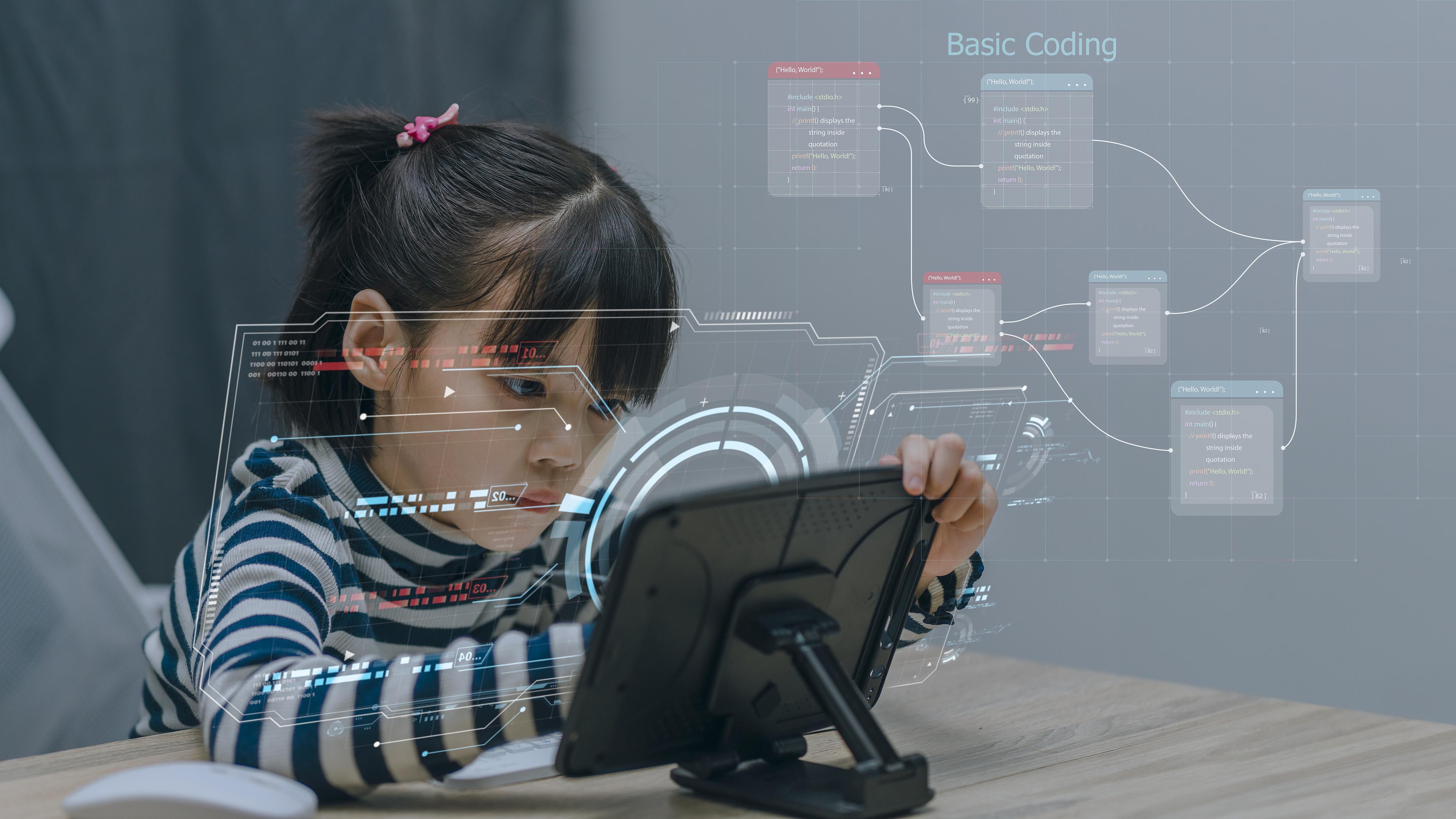 A young girl is learning the basics of coding. /CFP