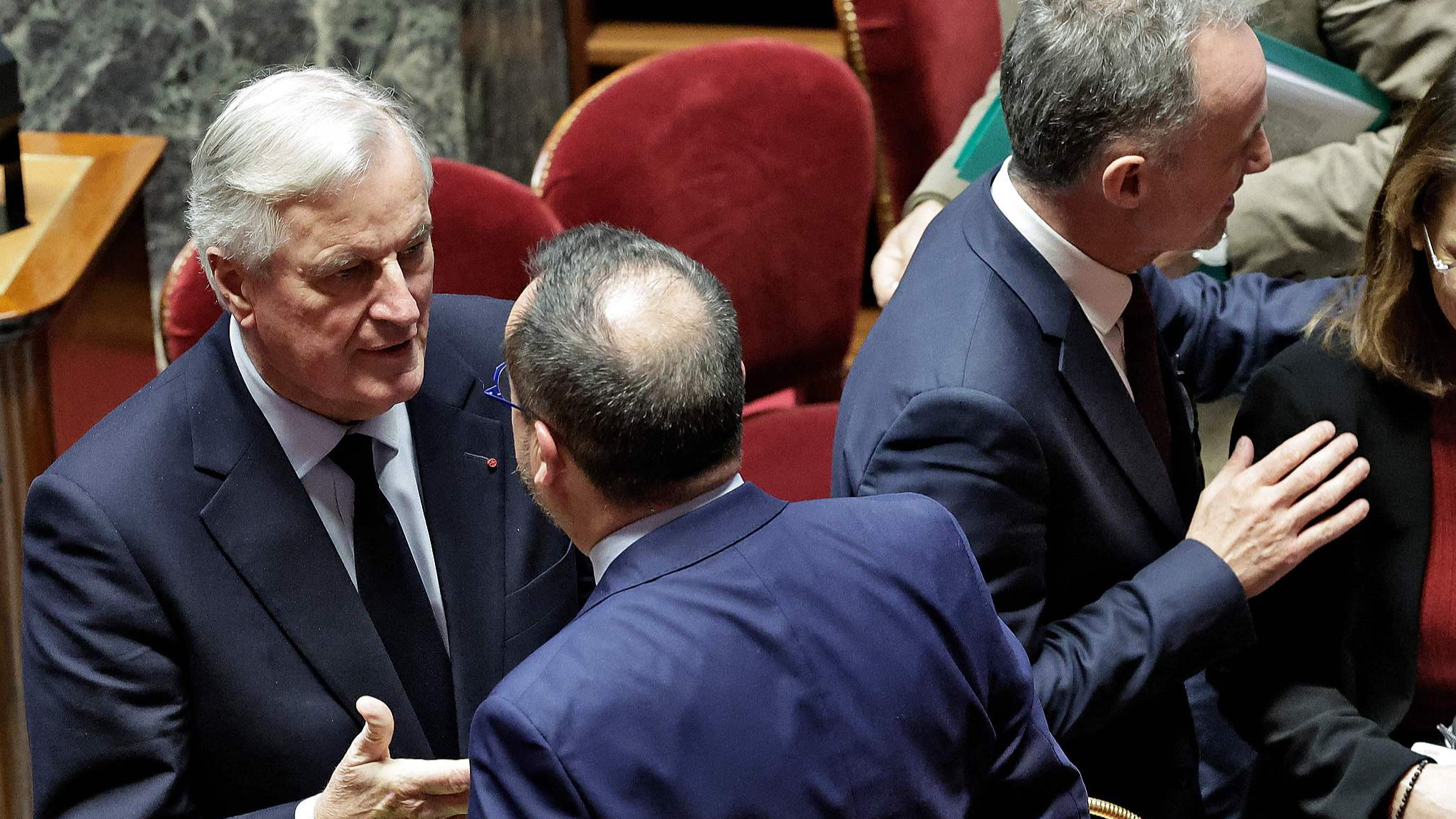 French Prime Minister Michel Barnier (L) is seen prior to delivering a speech during the voting session on the draft of the Social Security bill 2025 at the National Assembly, the French Parliament's lower house, in Paris, France, December 2, 2024. /CFP