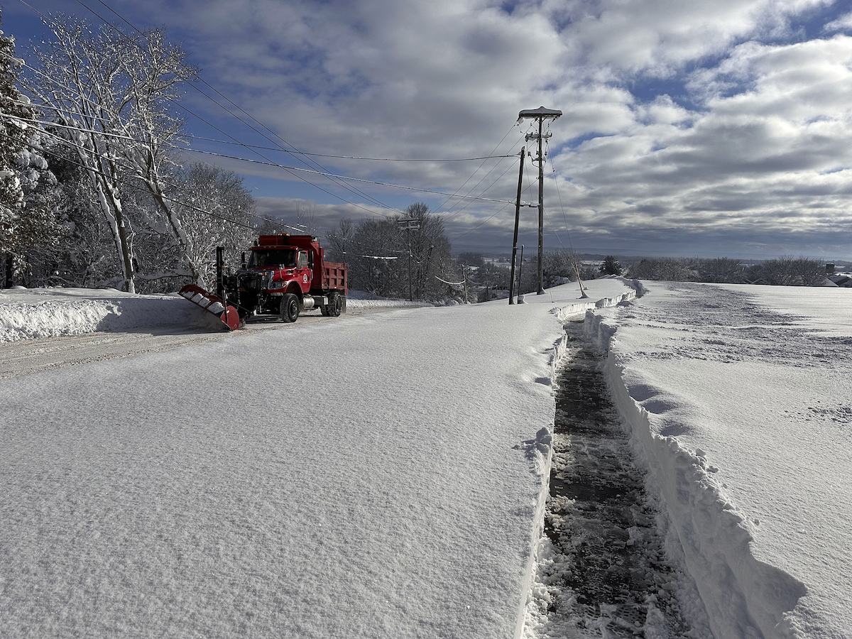 A snowplow in action in Lowville, New York, the U.S., December 2, 2024. /CFP