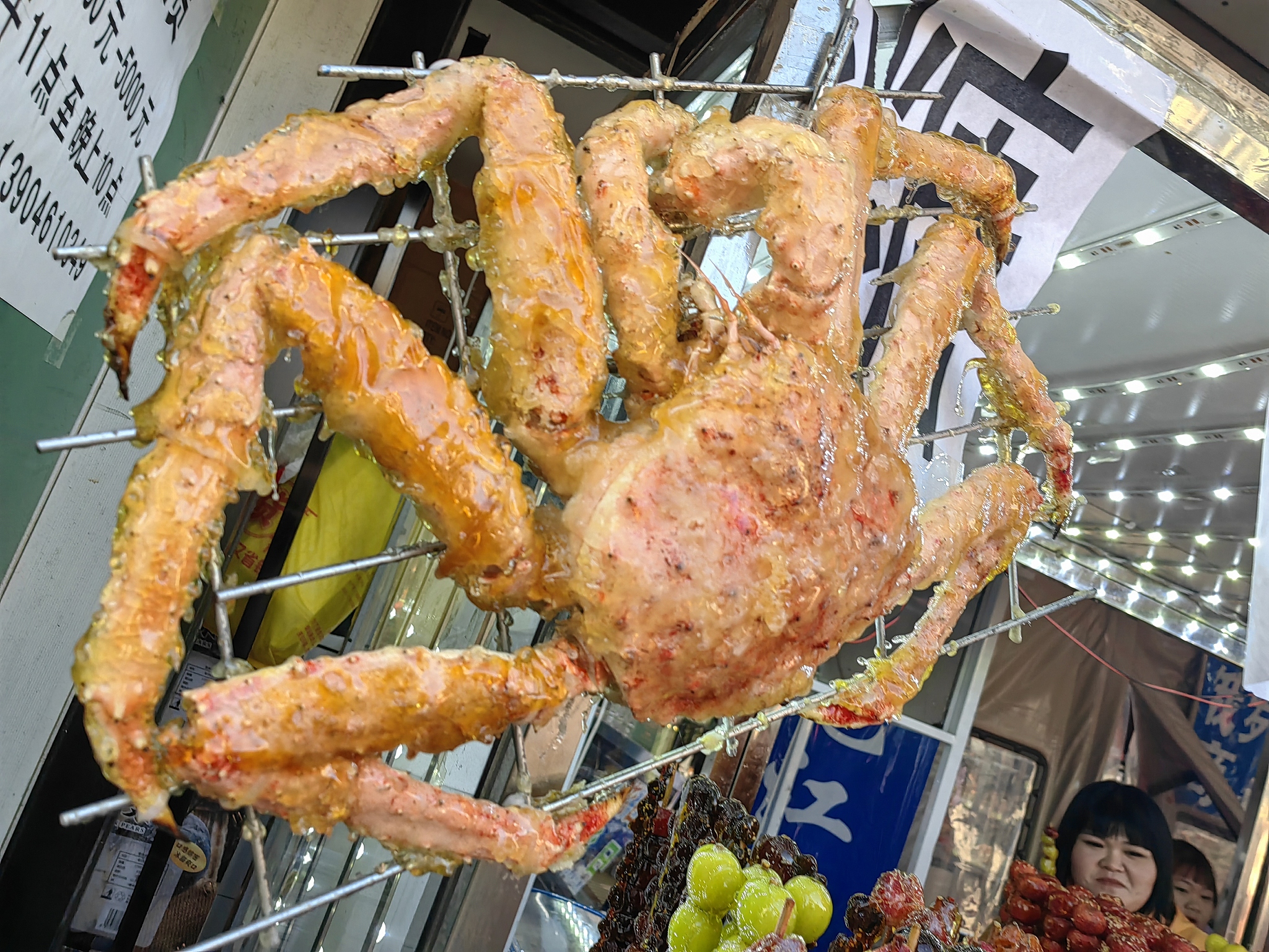 Various kinds of tanghulu snacks are displayed outside a shop in Harbin, Heilongjiang Province, December 2, 2024. /CFP