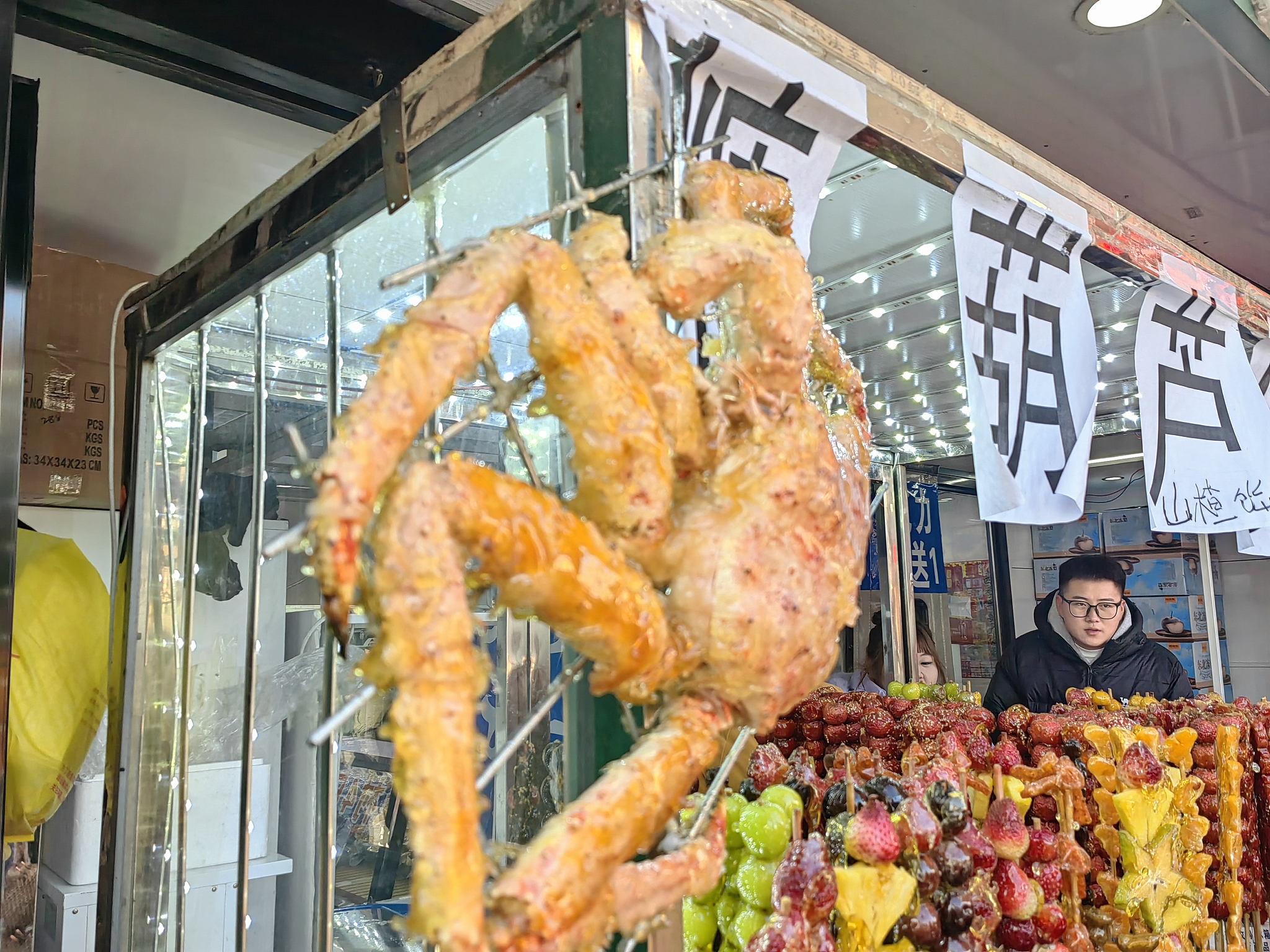 Various kinds of tanghulu snacks are displayed outside a shop in Harbin, Heilongjiang Province, December 2, 2024. /CFP